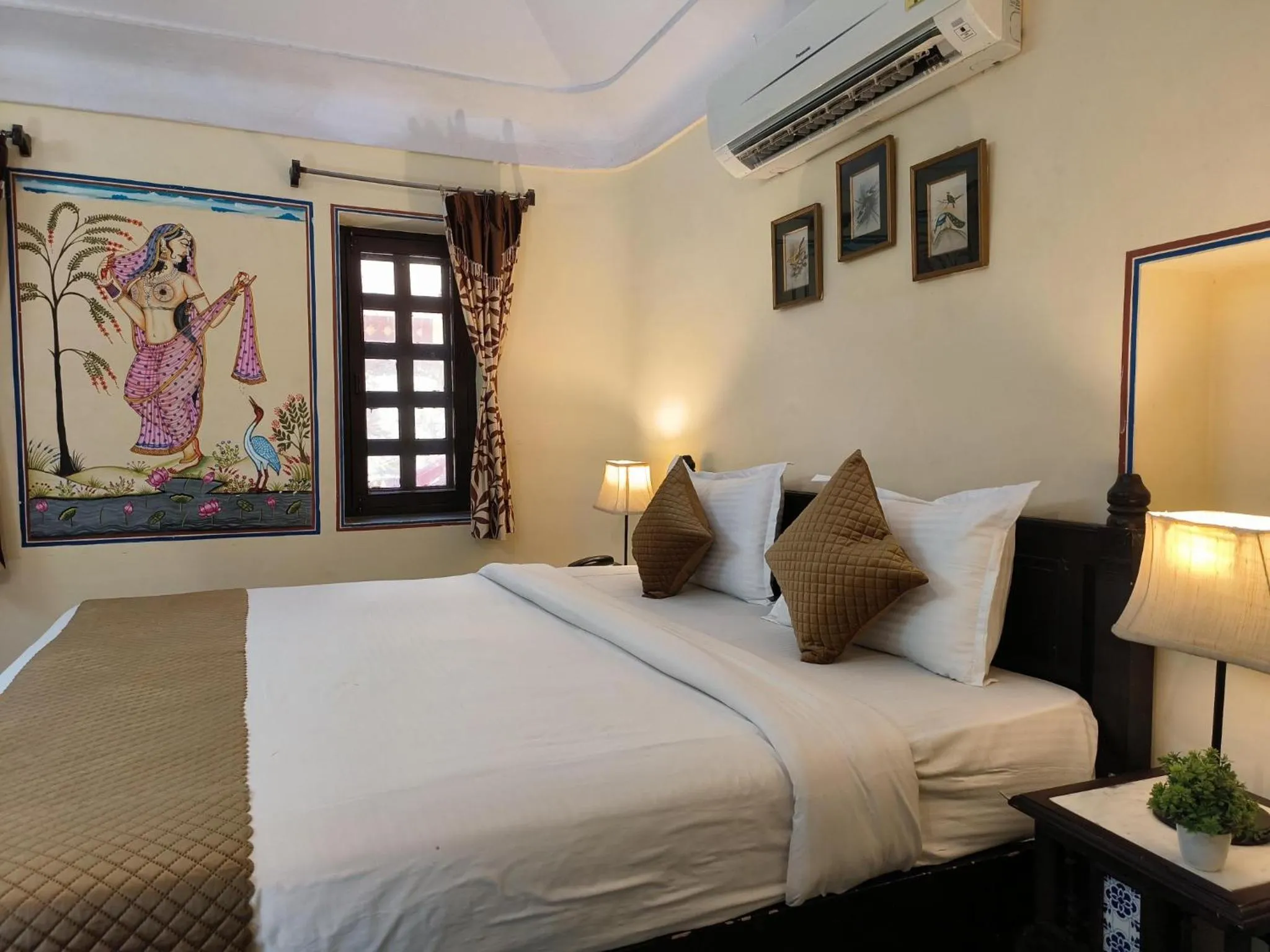 Bed in Sajjan Bagh Resort