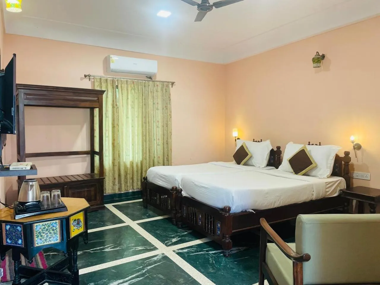 Bed in Sajjan Bagh Resort