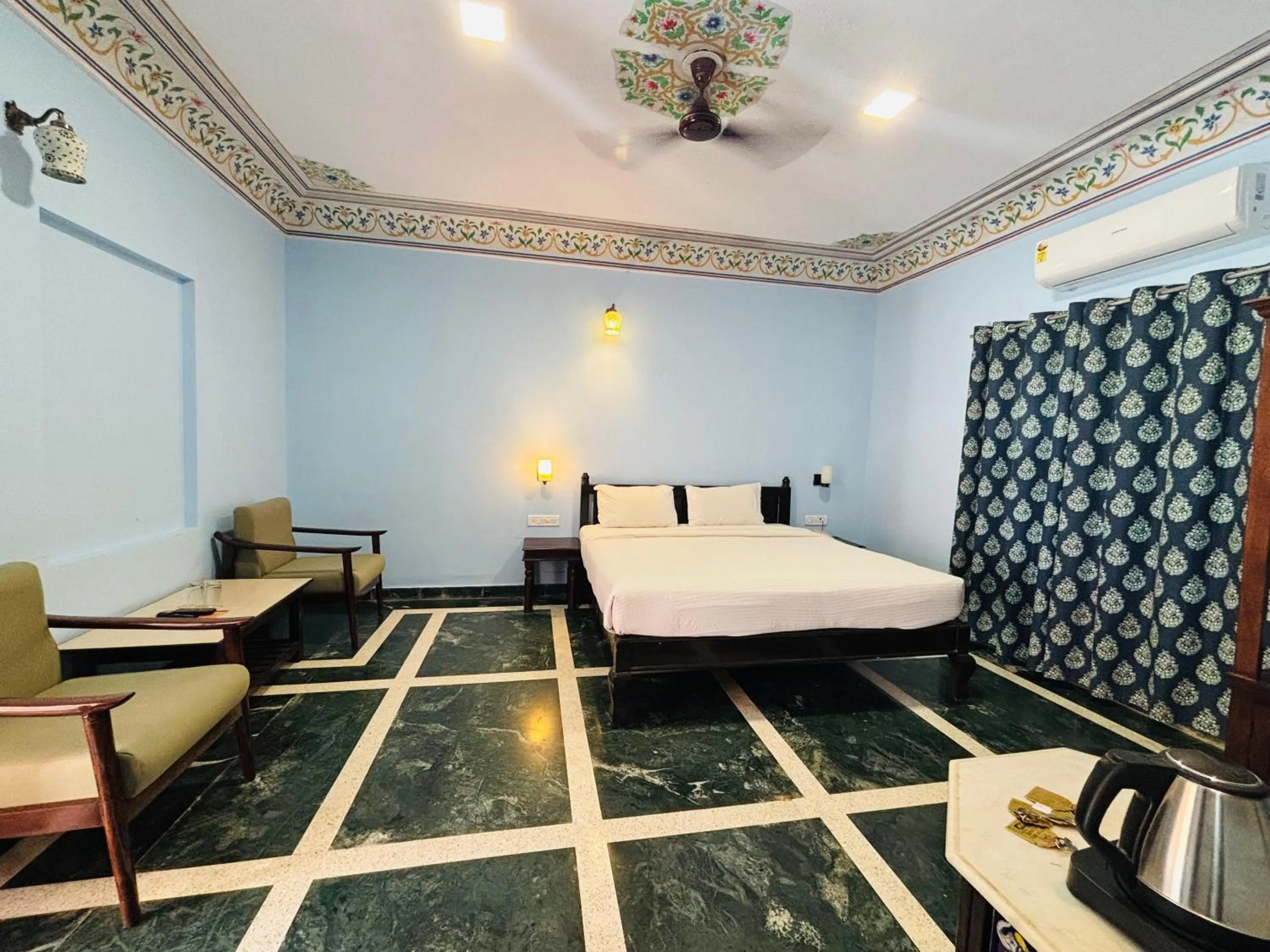 Bed in Sajjan Bagh Resort