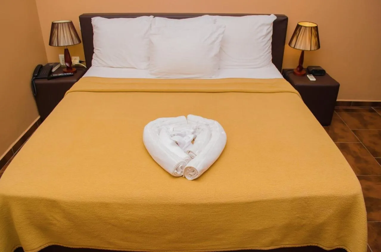 Bed in Sheva Hotel