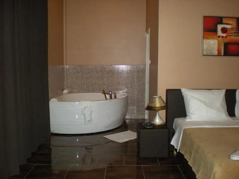 Shower, Bed in Sheva Hotel
