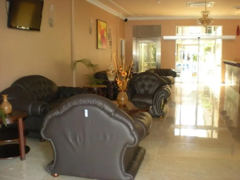 Communal lounge/ TV room in Sheva Hotel