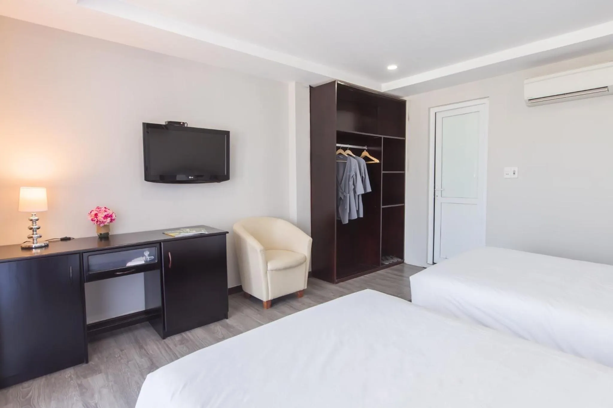 Communal lounge/ TV room in Binh Duong Resident Hotel