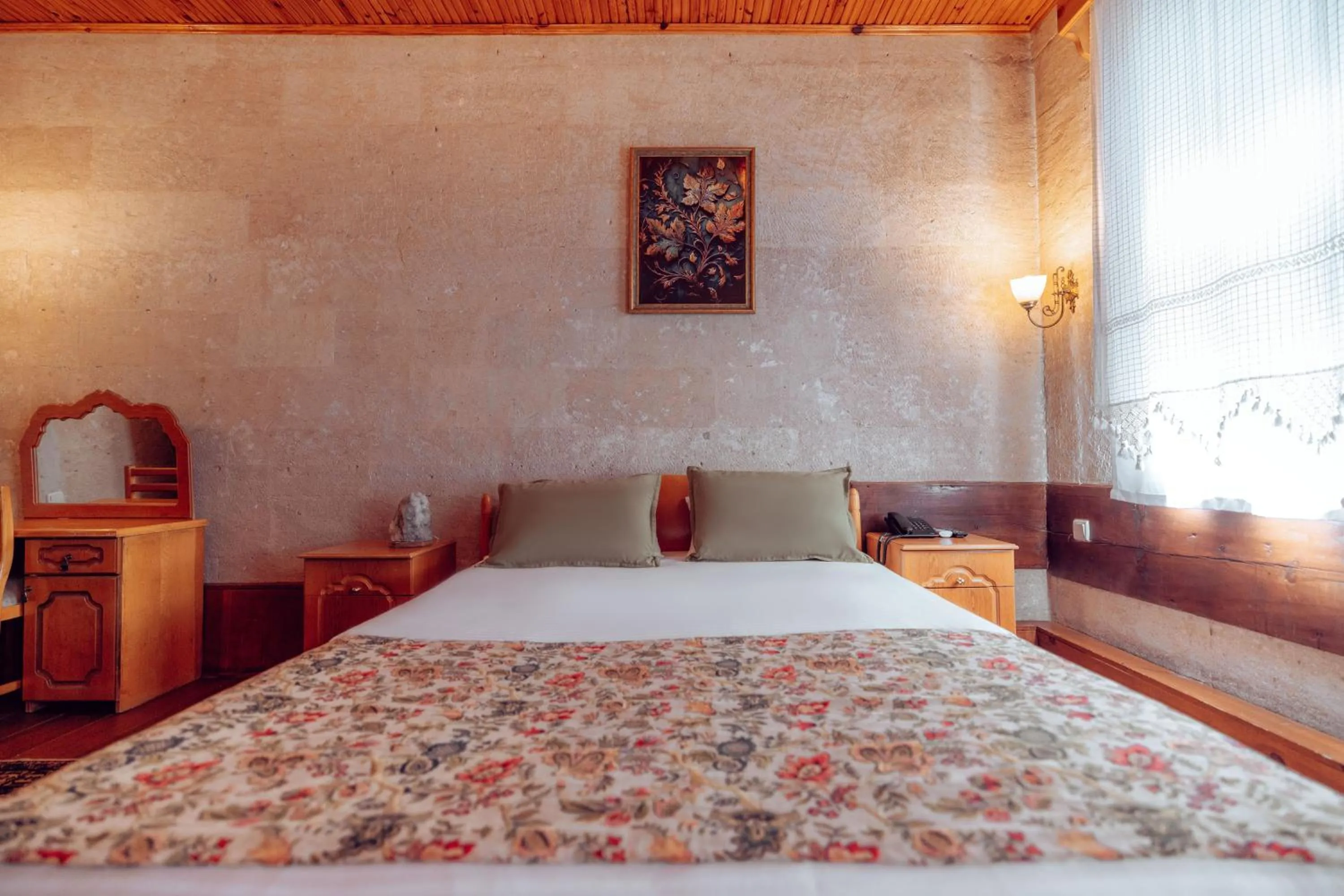 Bed in Melis Cave Hotel