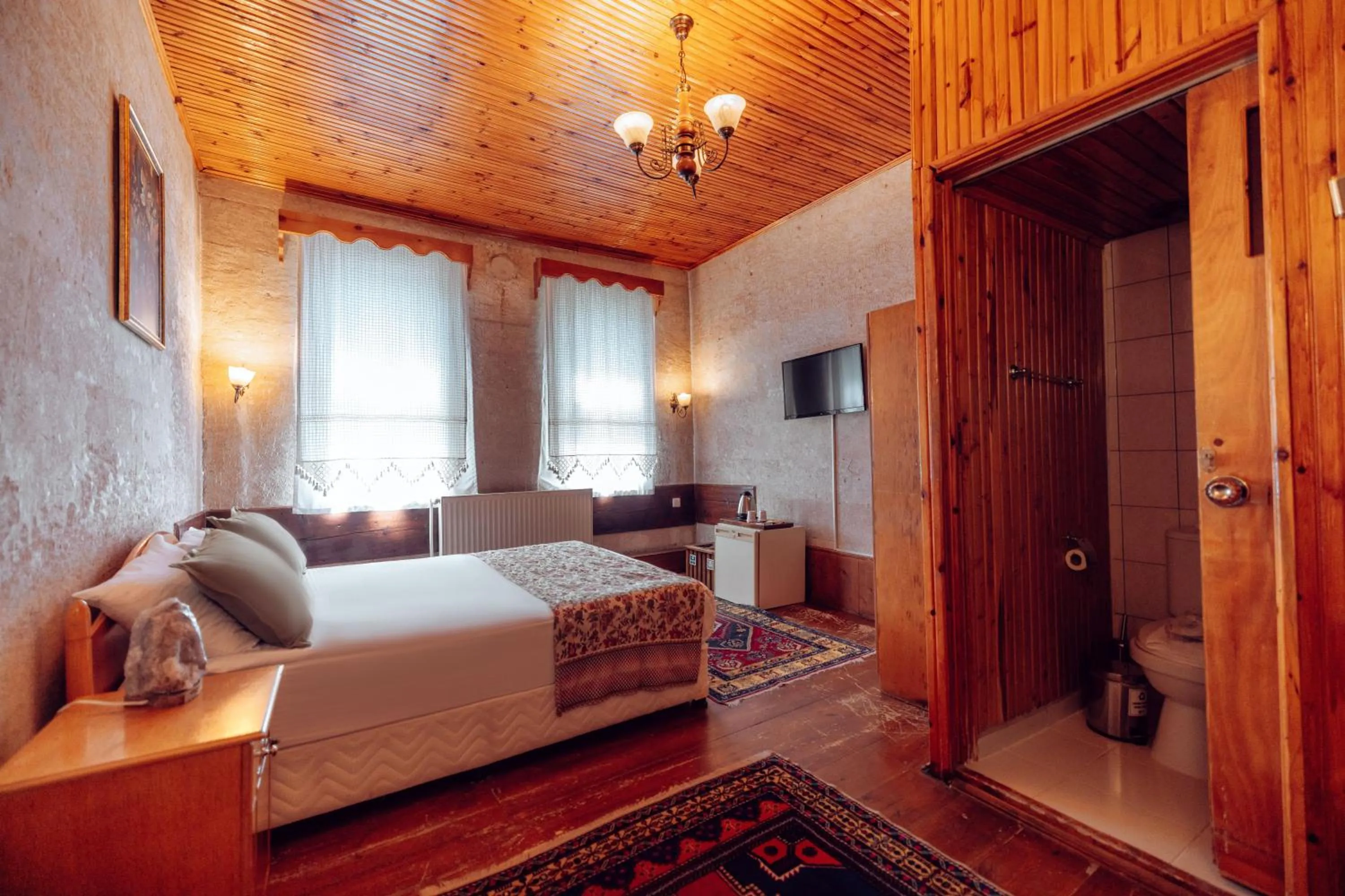 Bed in Melis Cave Hotel