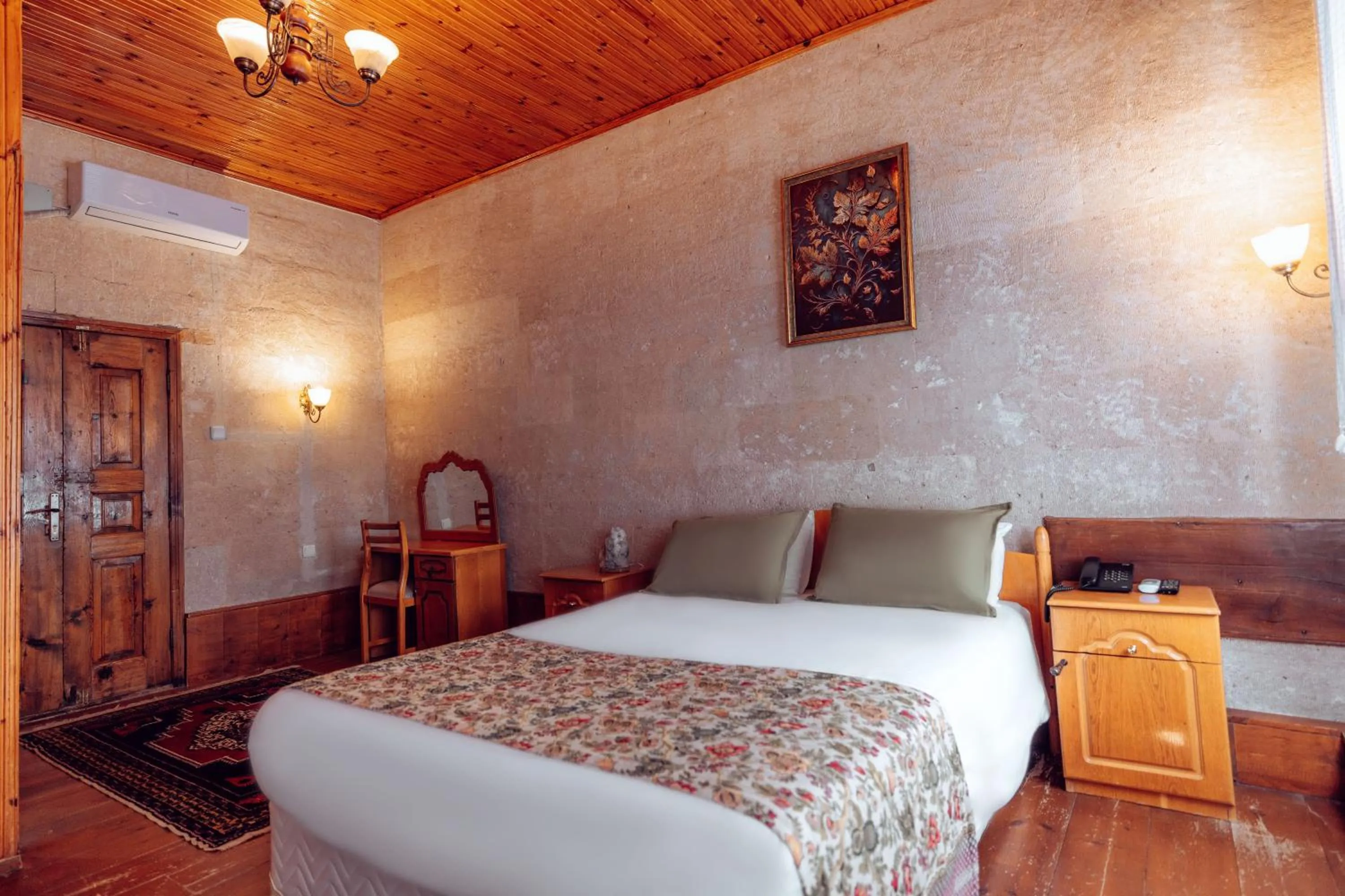 Bed in Melis Cave Hotel