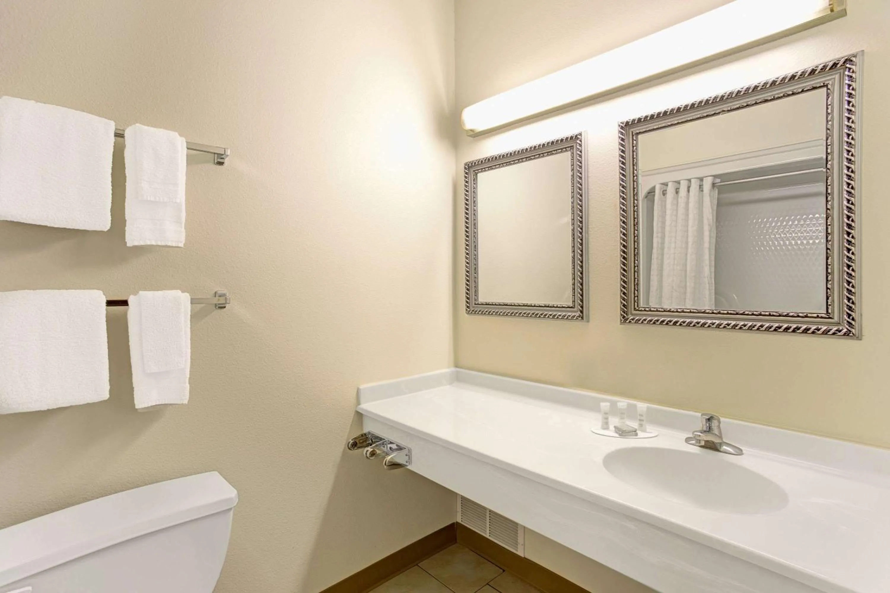 Bathroom in Super 8 by Wyndham Gurnee