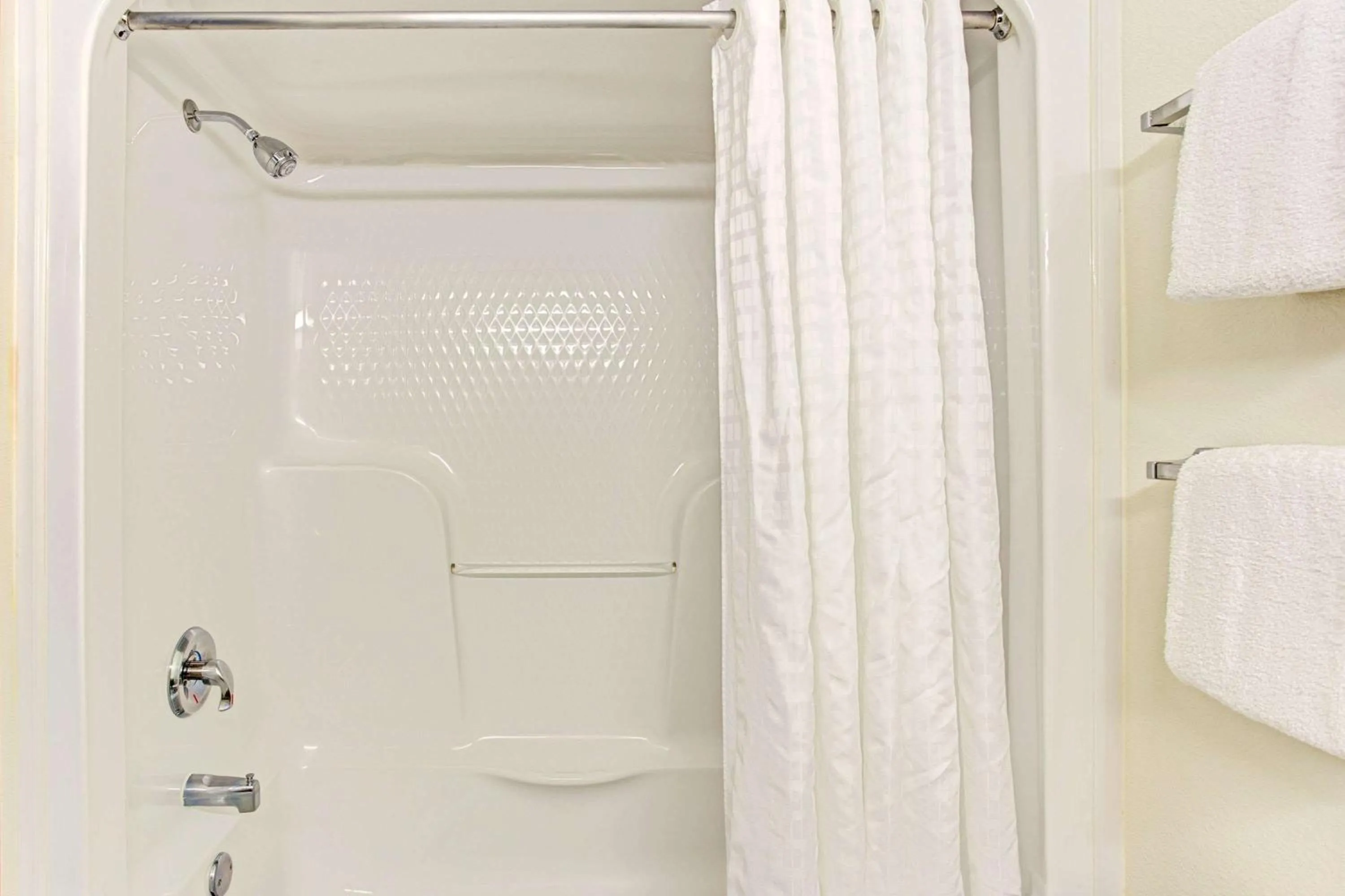 Bathroom in Super 8 by Wyndham Gurnee