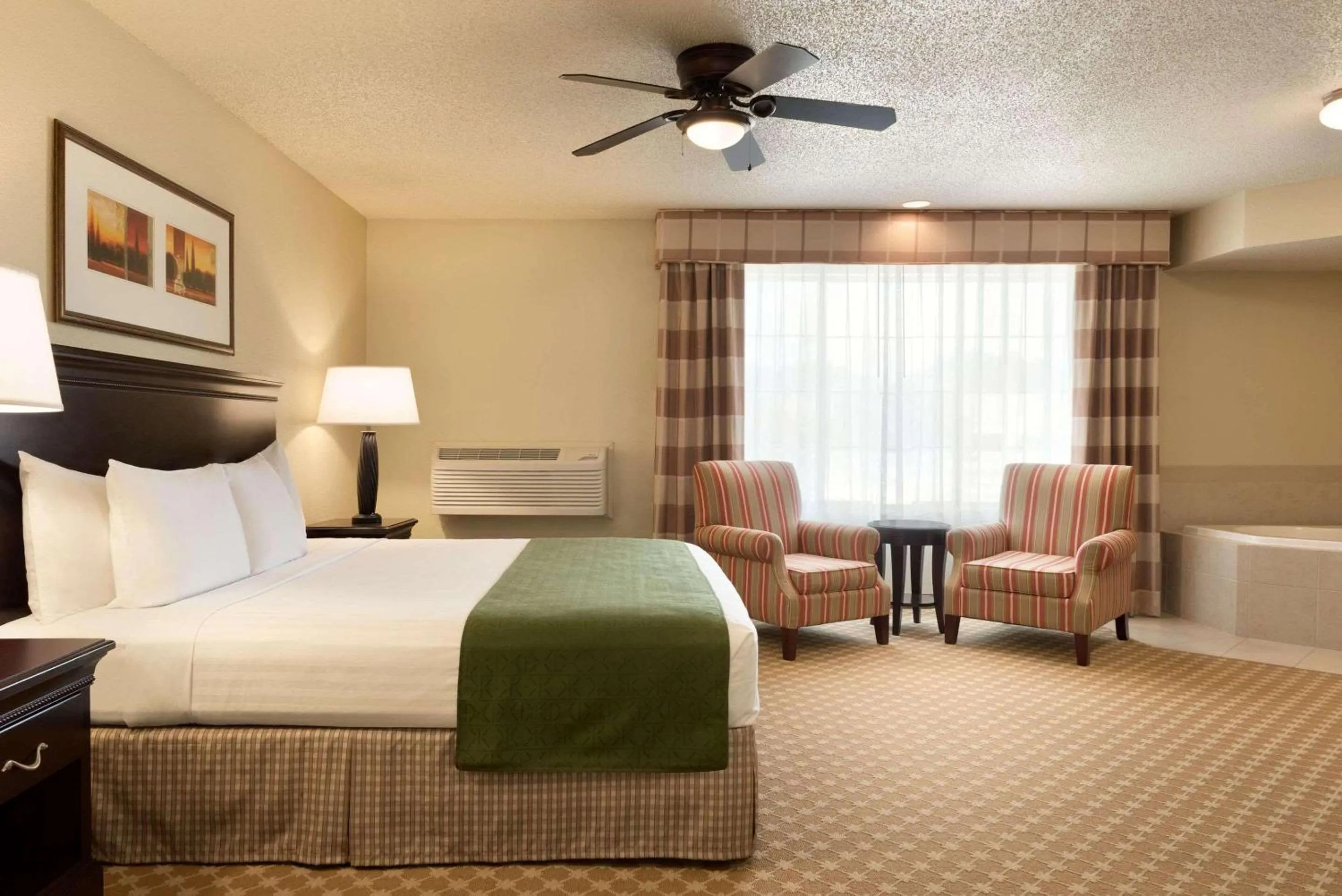 Bedroom in Country Inn & Suites by Radisson, Chanhassen, MN