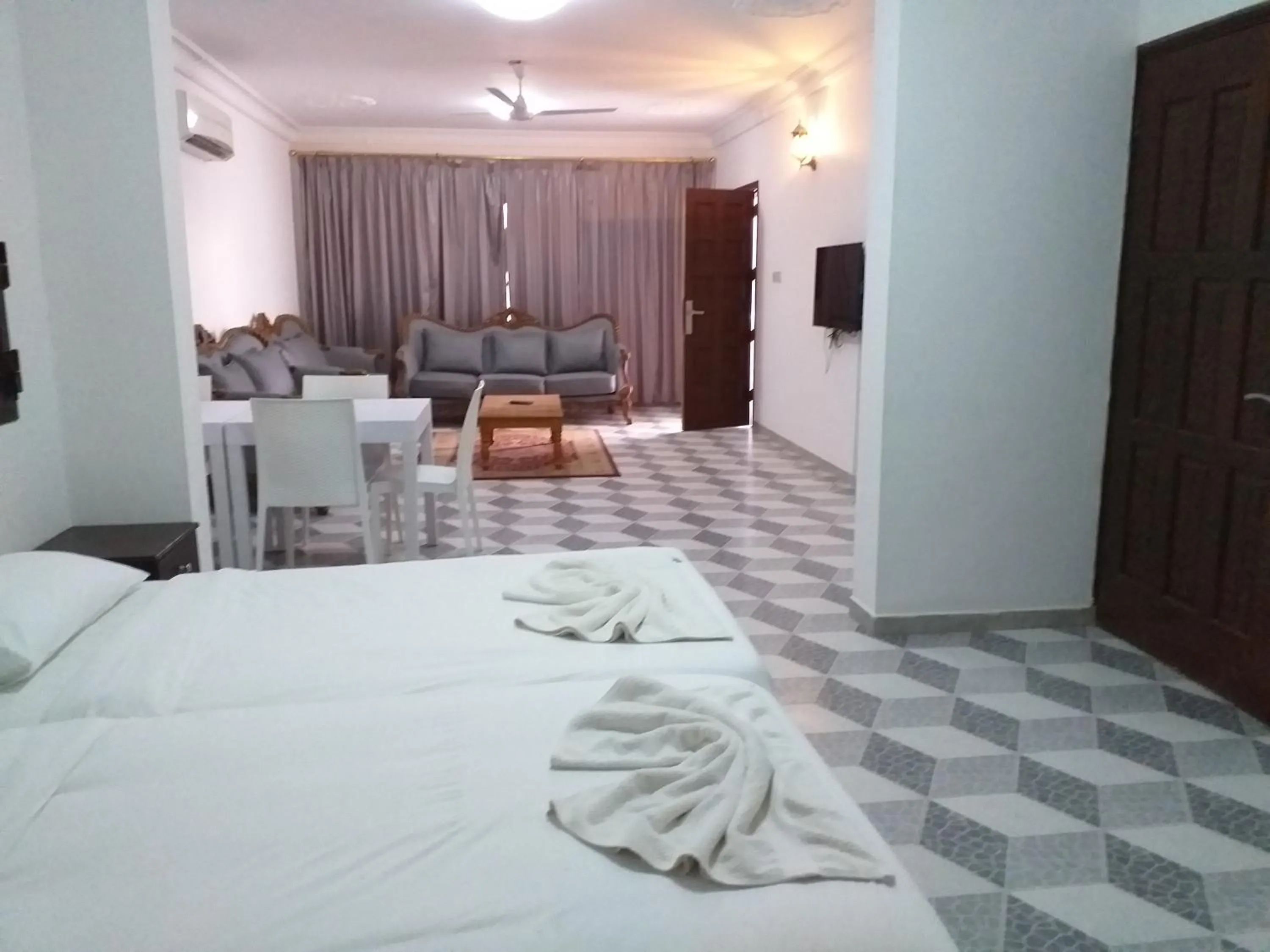 Photo of the whole room, Bed in Salalah Beach Villas