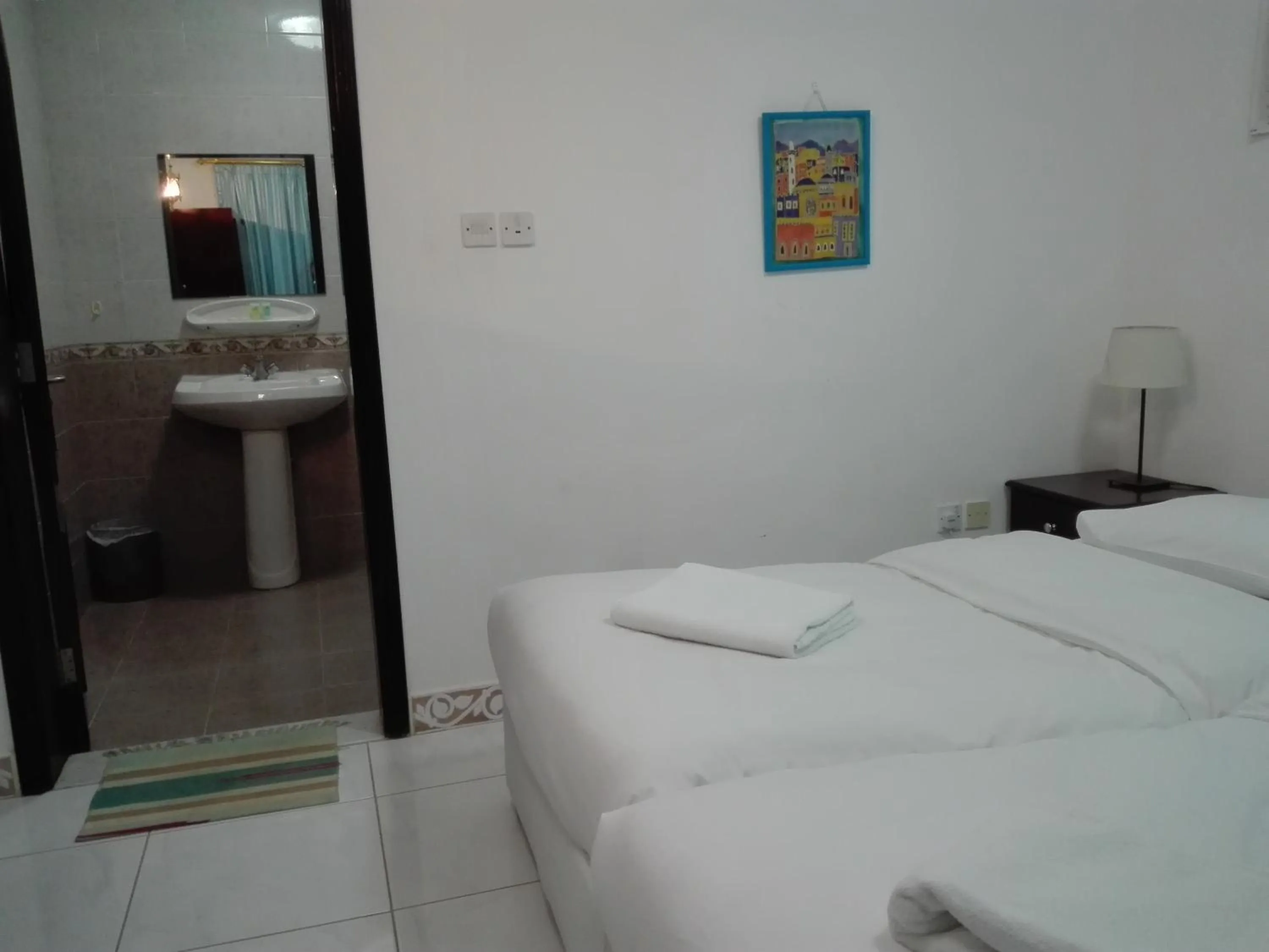 Bed in Salalah Beach Villas