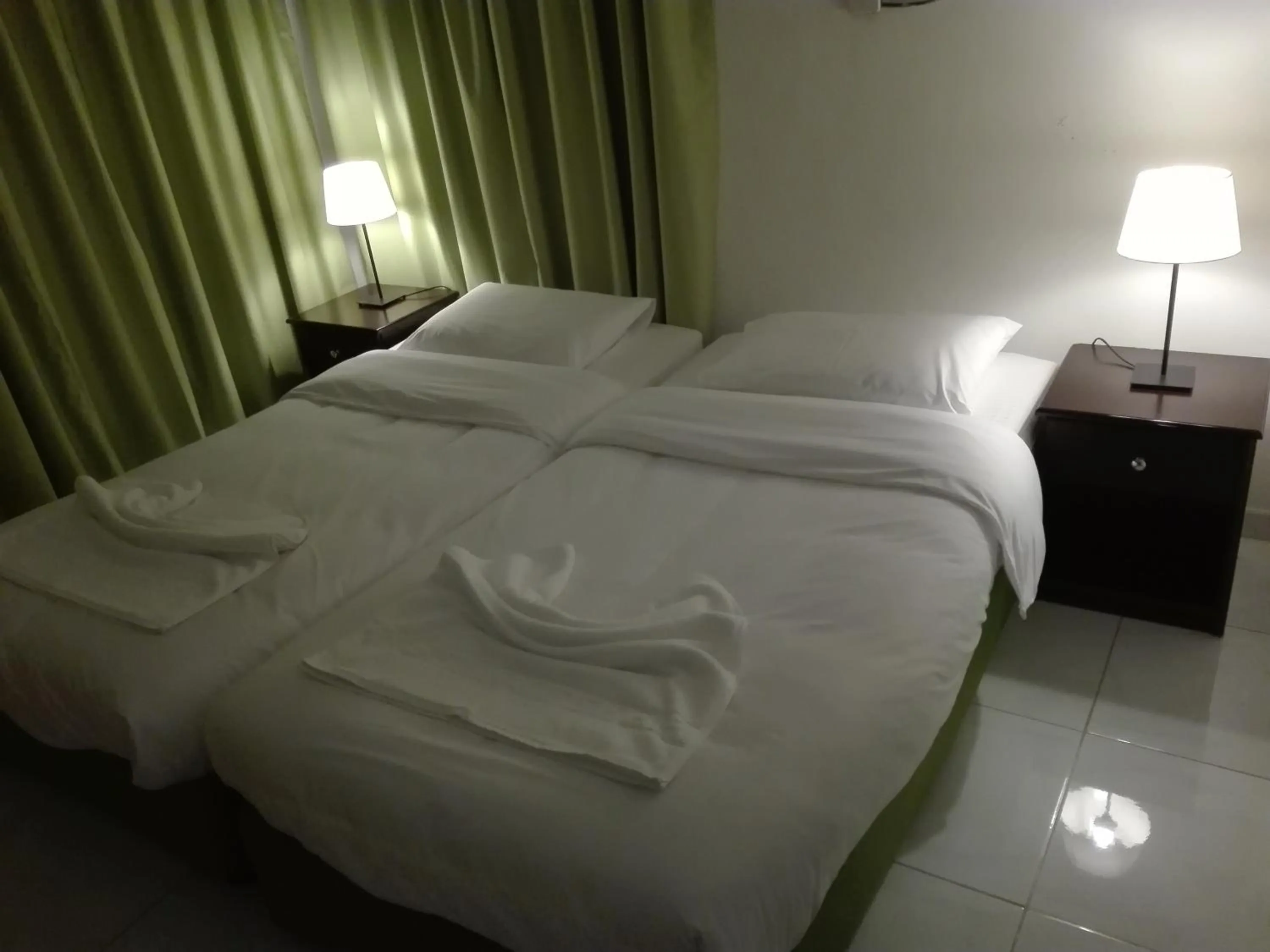 Bed in Salalah Beach Villas