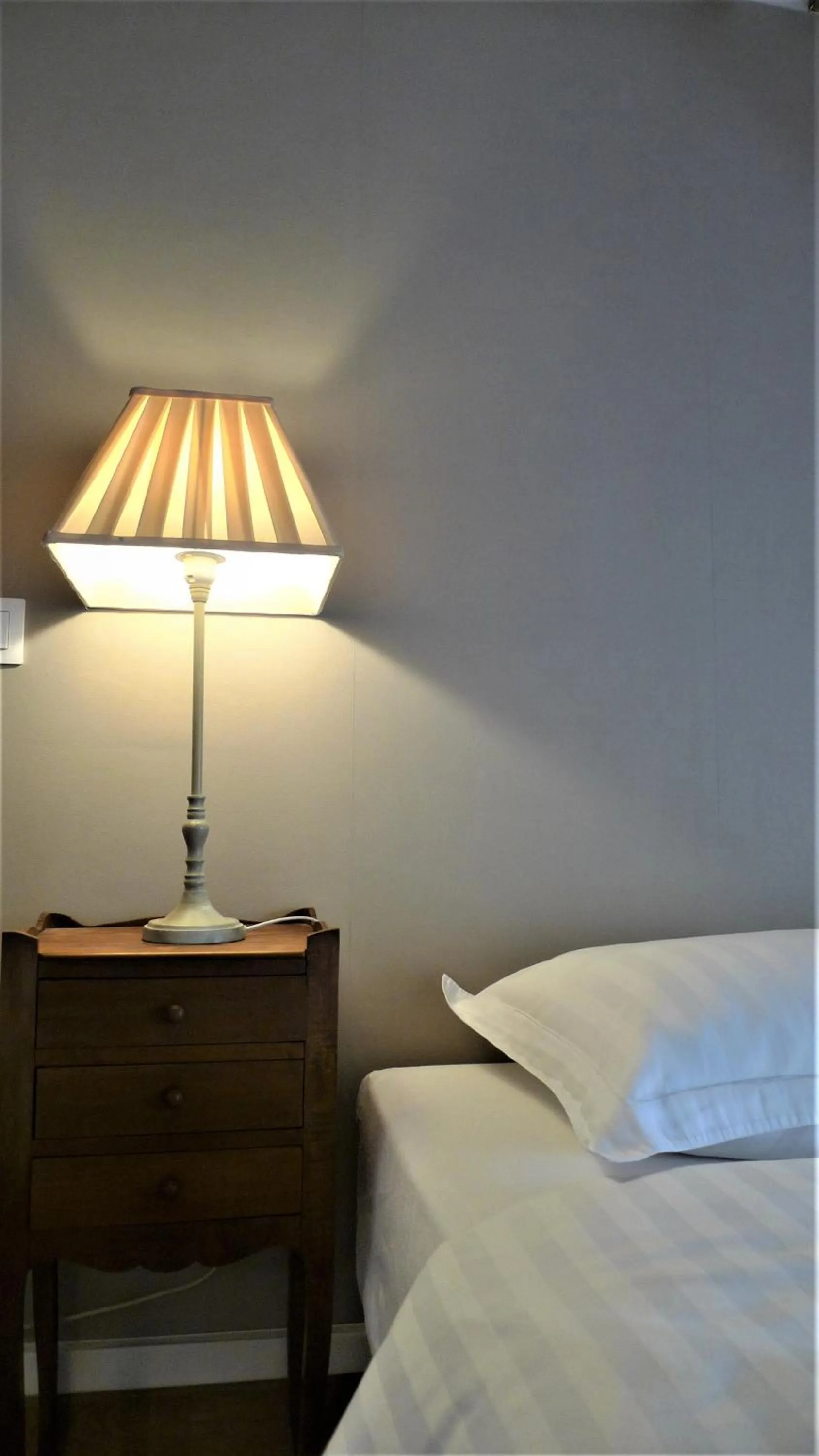 Bed in Les chambres de l'Abbaye