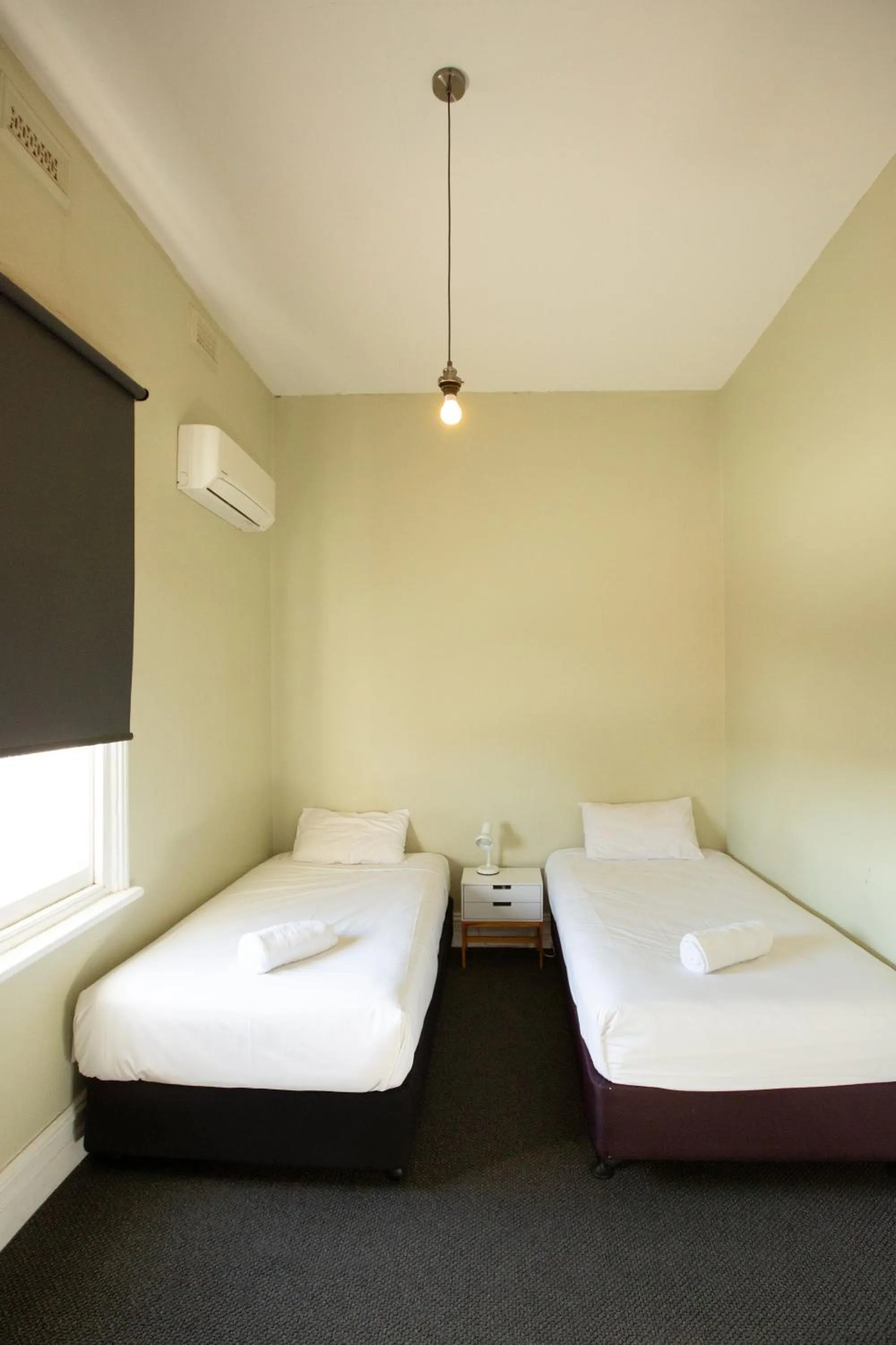 Bed in Finley Country Club Hotel Motel