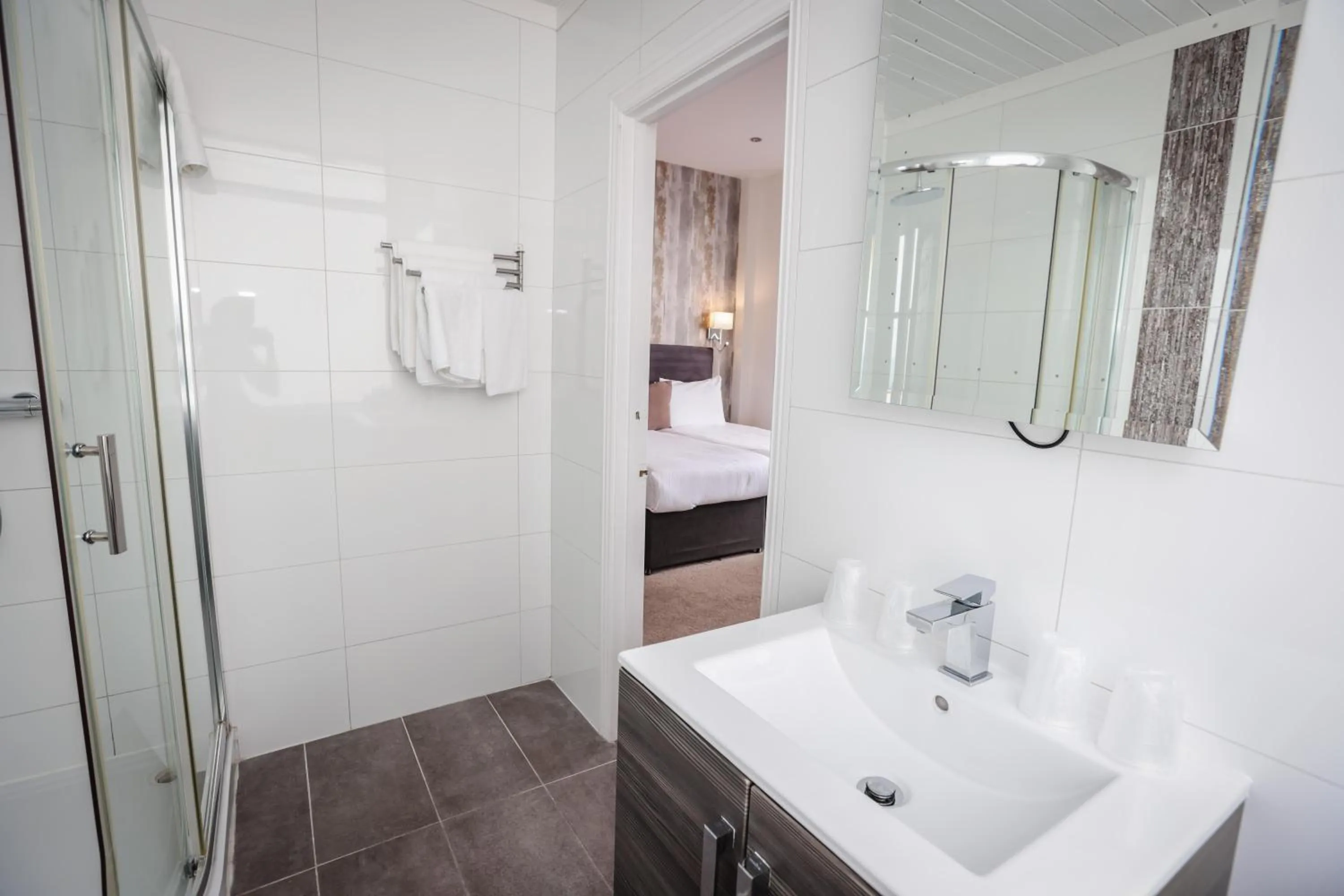 Shower, Bed in Ocean Beach Hotel & Spa - OCEANA COLLECTION