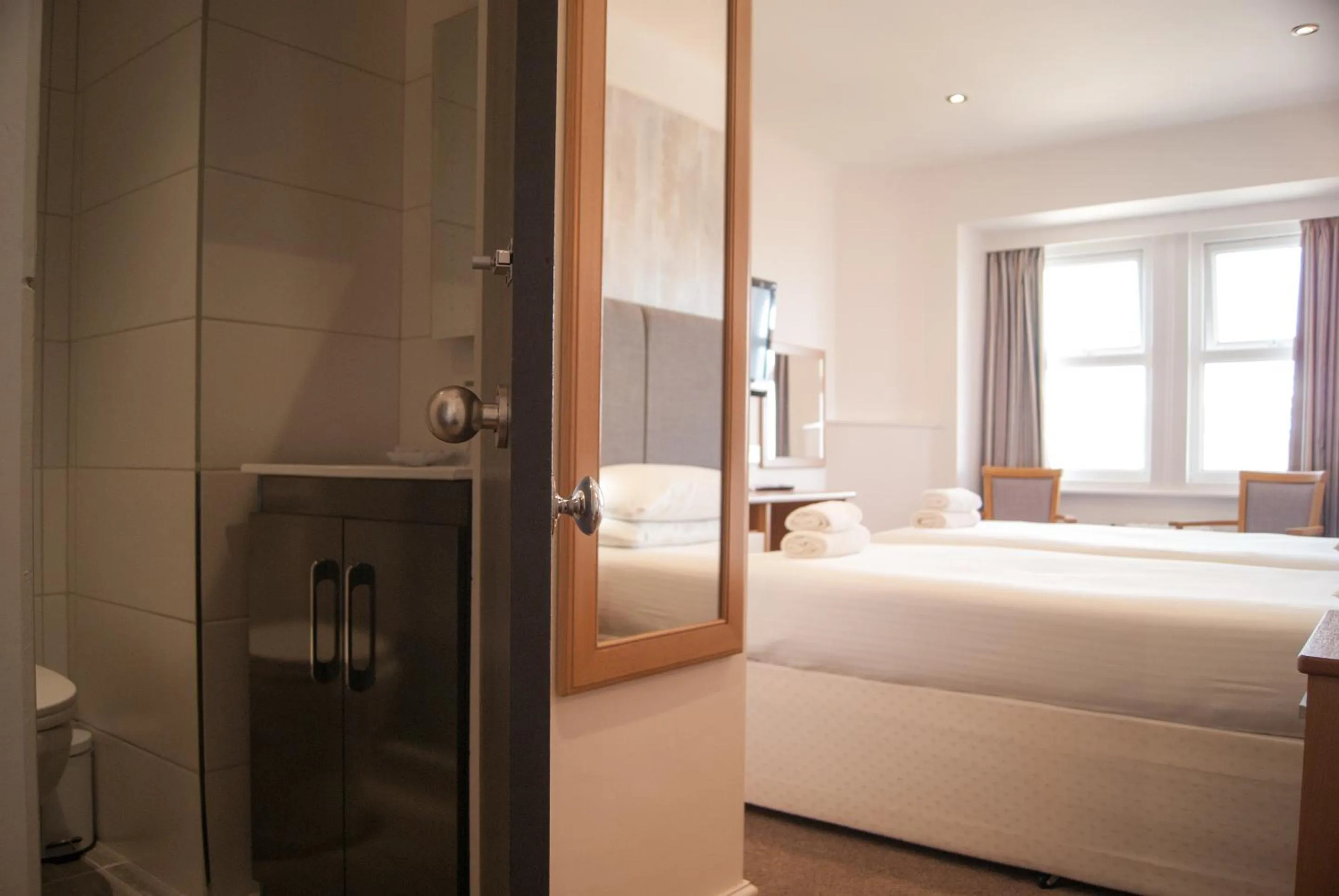 Bathroom, Bed in Ocean Beach Hotel & Spa - OCEANA COLLECTION