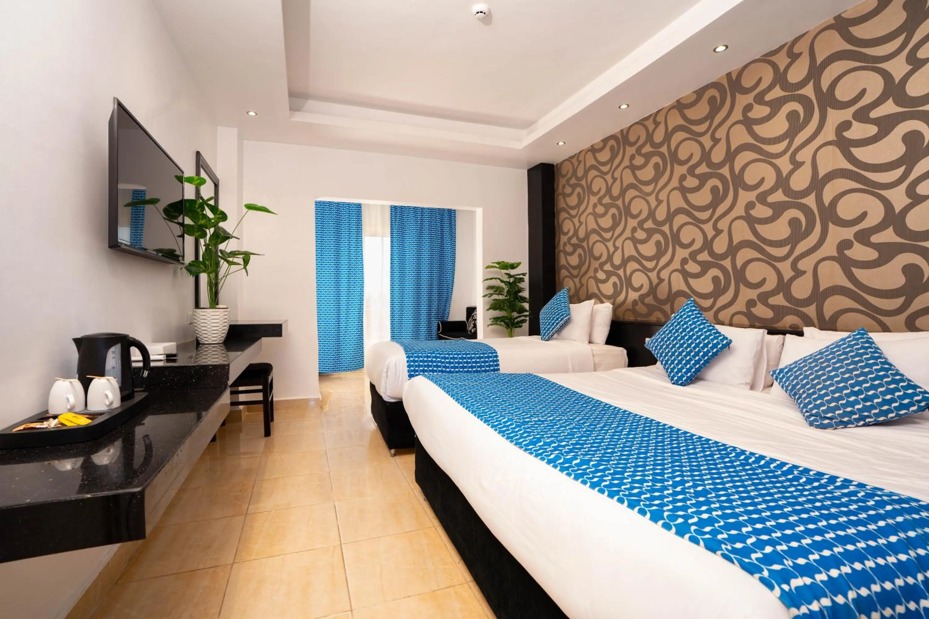 Photo of the whole room, Bed in Bellagio Beach Resort & Spa