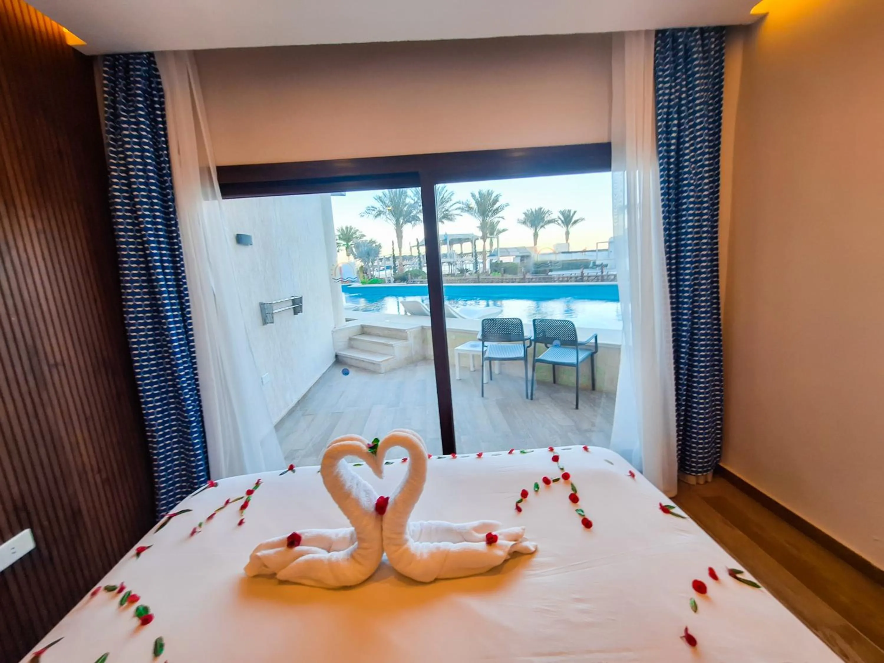 View (from property/room), Bed in Bellagio Beach Resort & Spa