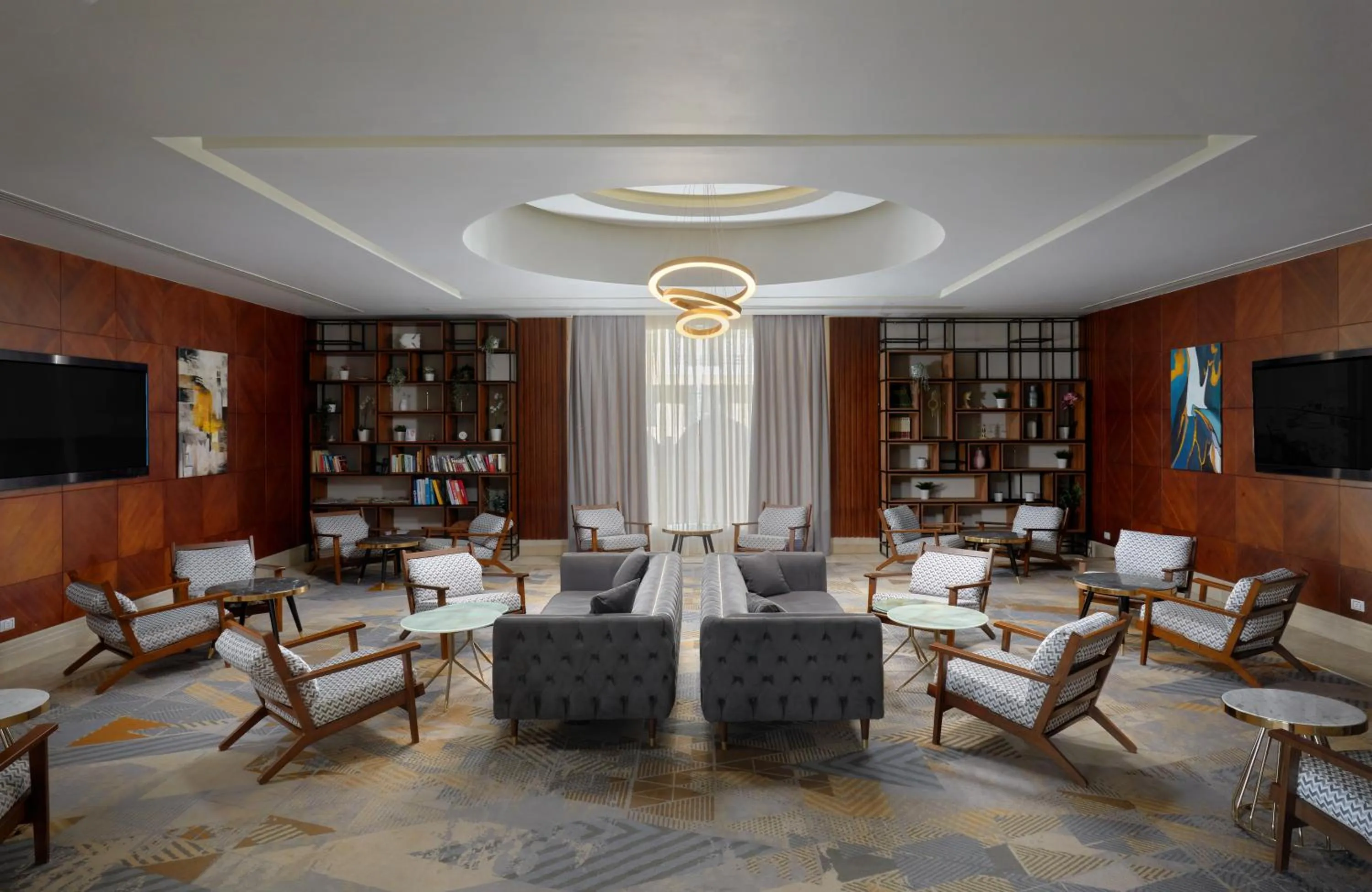 Communal lounge/ TV room in Bellagio Beach Resort & Spa