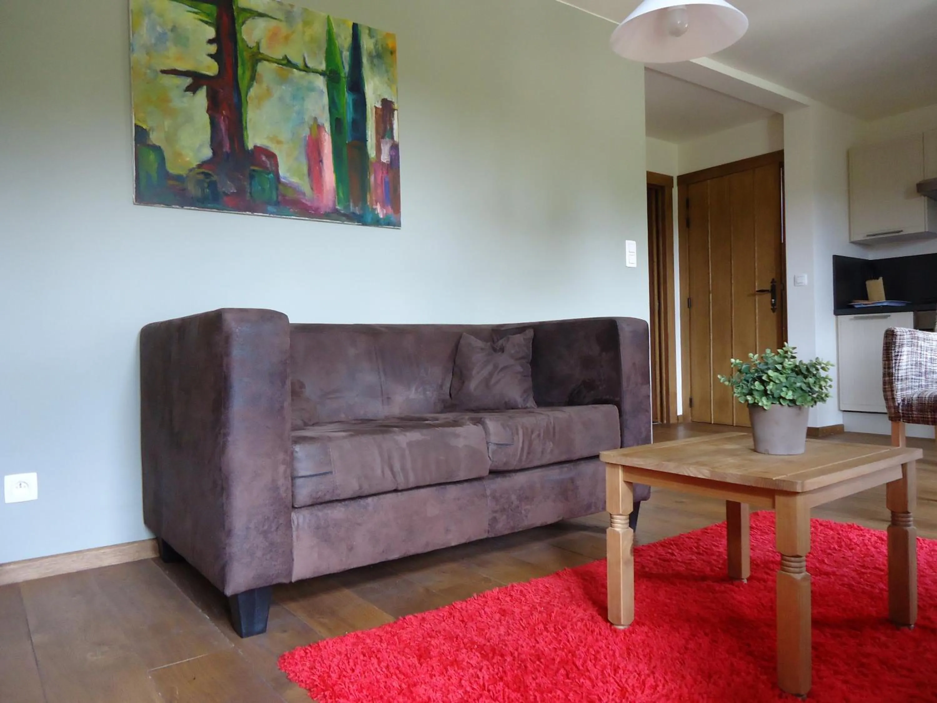 Seating area in B&B Ferme de Leuze Rustieke Gîtes nabij Durbuy, eigen laadpalen