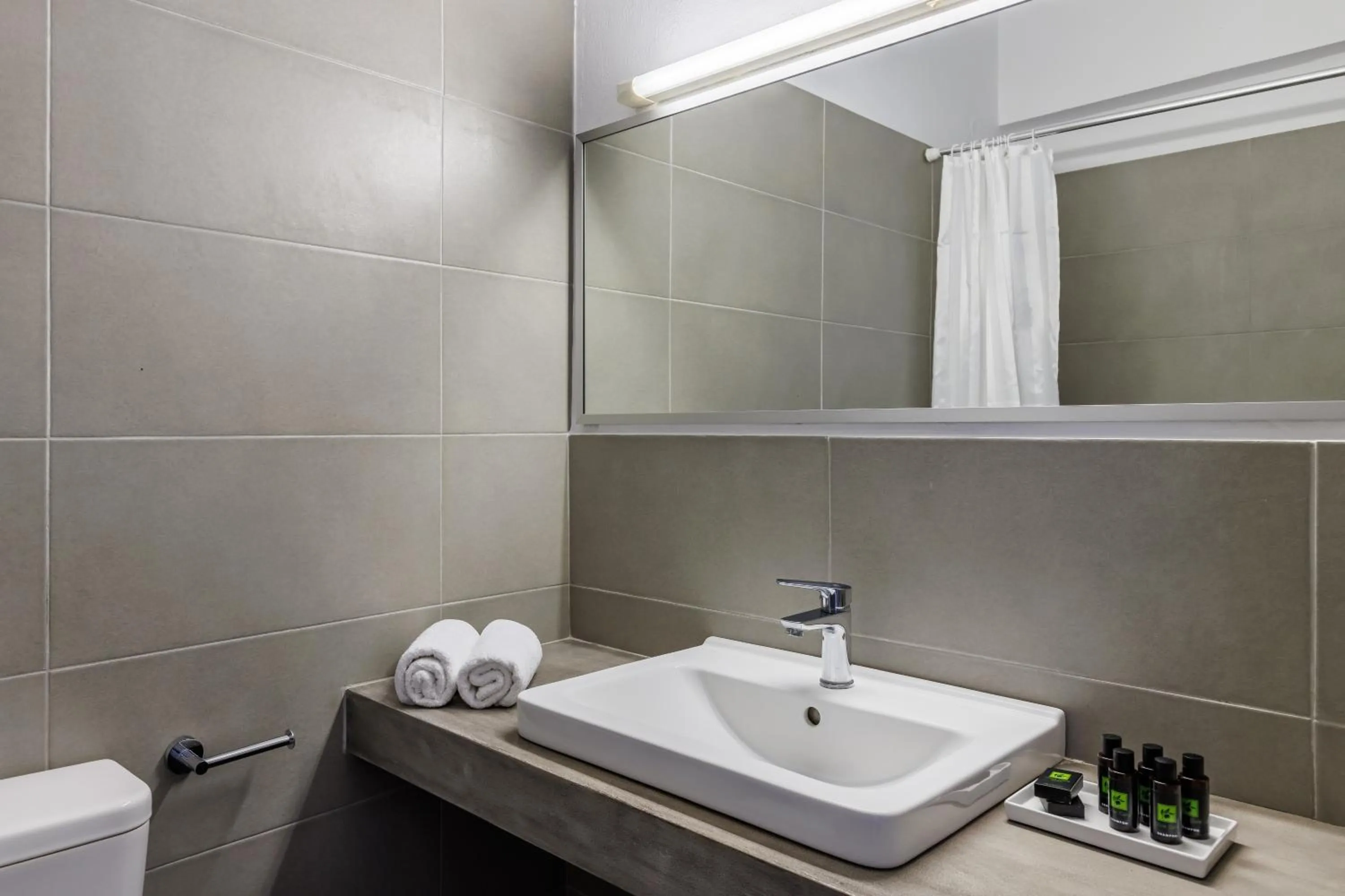 Bathroom in Aperitton Hotel
