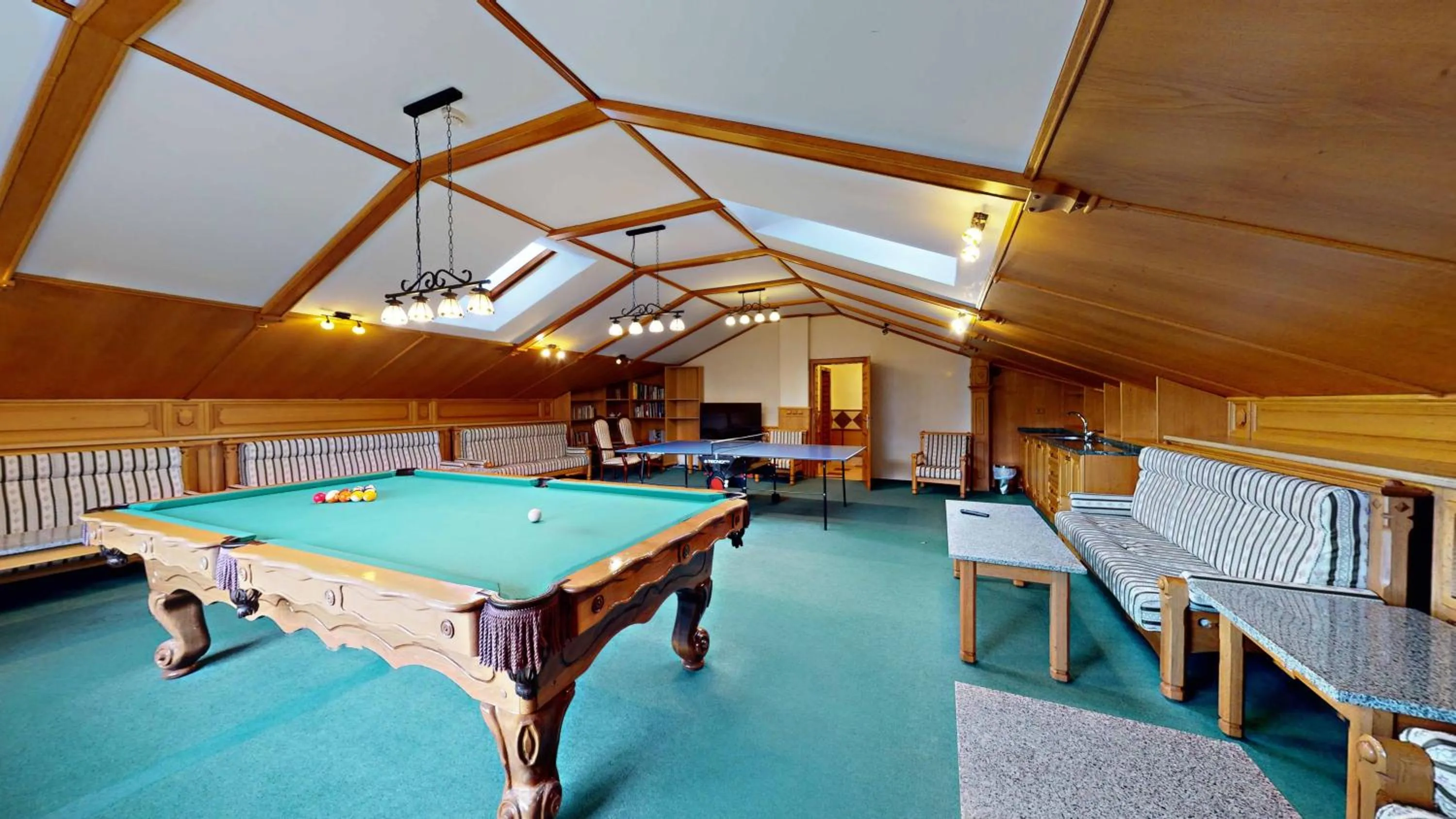 Communal lounge/ TV room in Hotel Diana