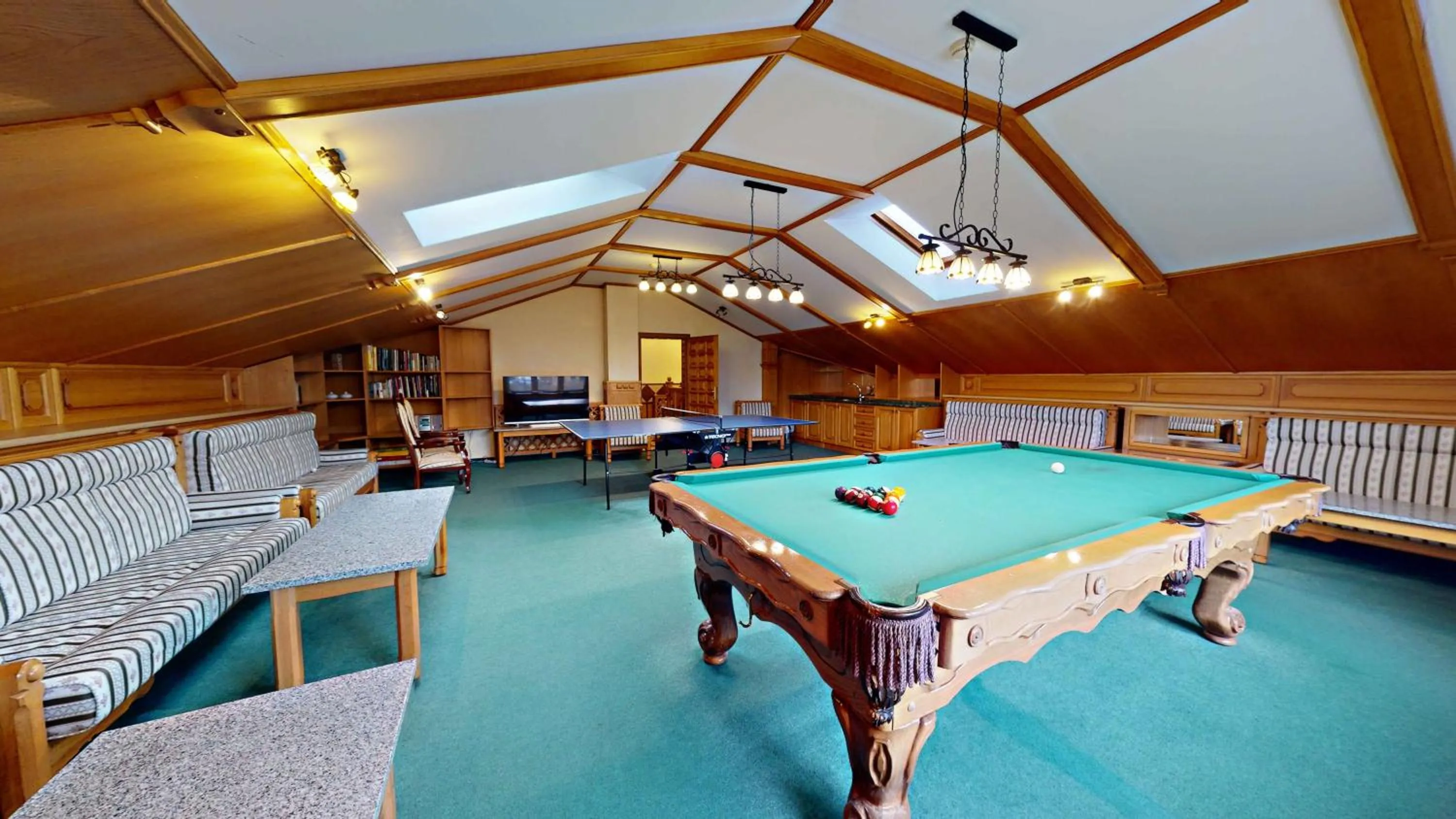 Communal lounge/ TV room in Hotel Diana