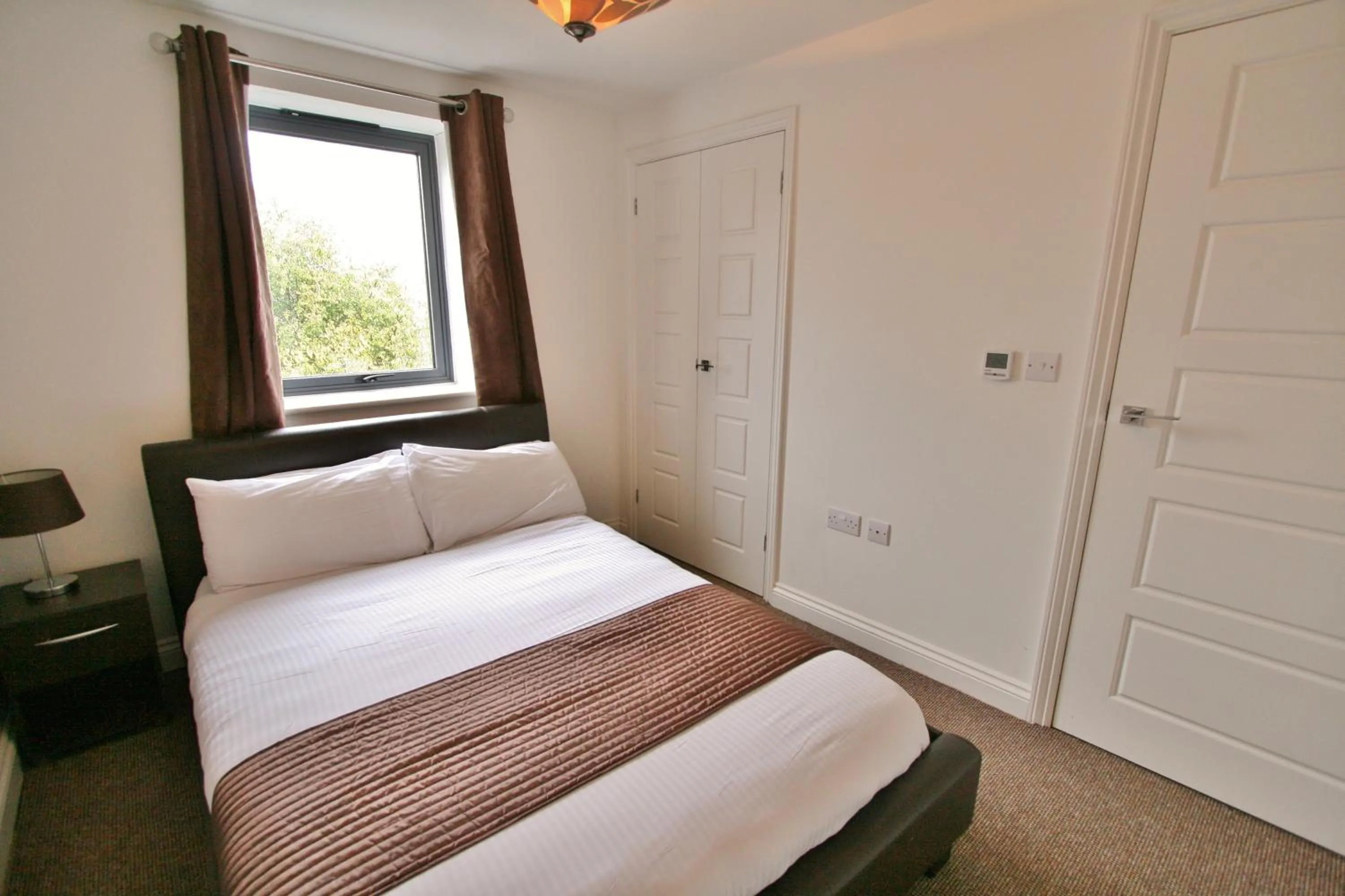 Bedroom, Bed in Central Hotel Cheltenham by Roomsbooked