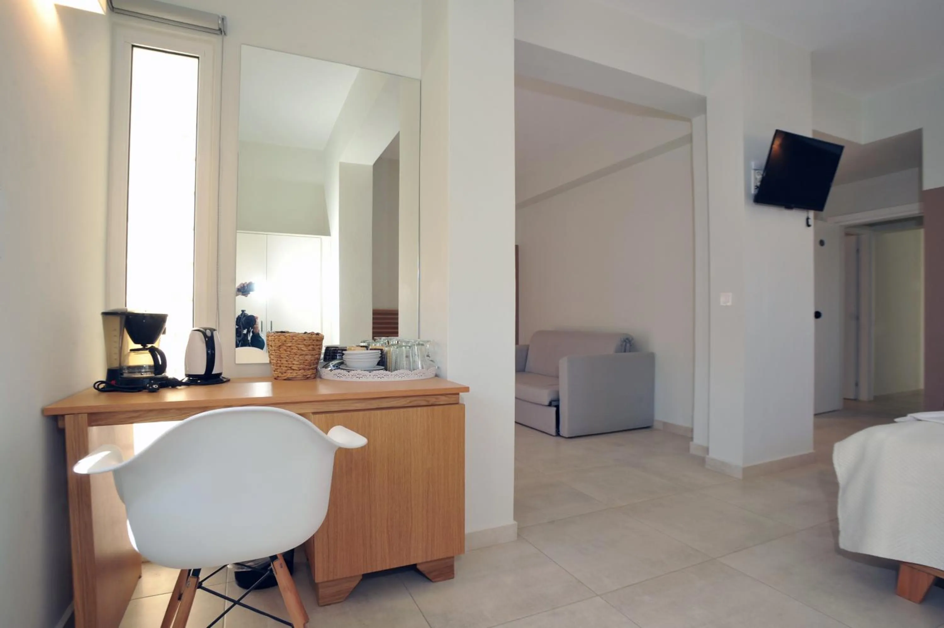 Bed in Mithos Premium Rooms