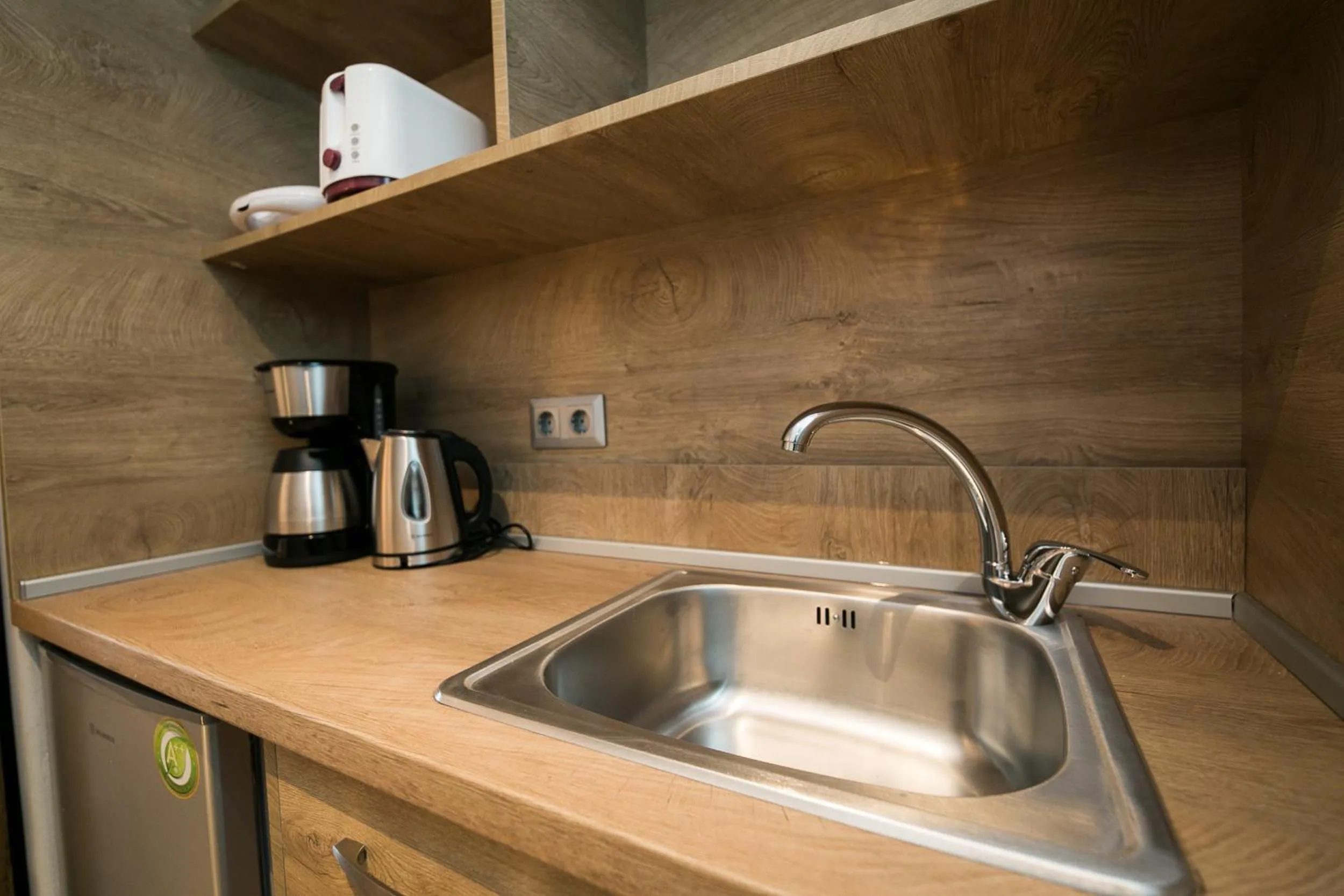 Kitchen or kitchenette in Sunrise Village Hotel Apartments