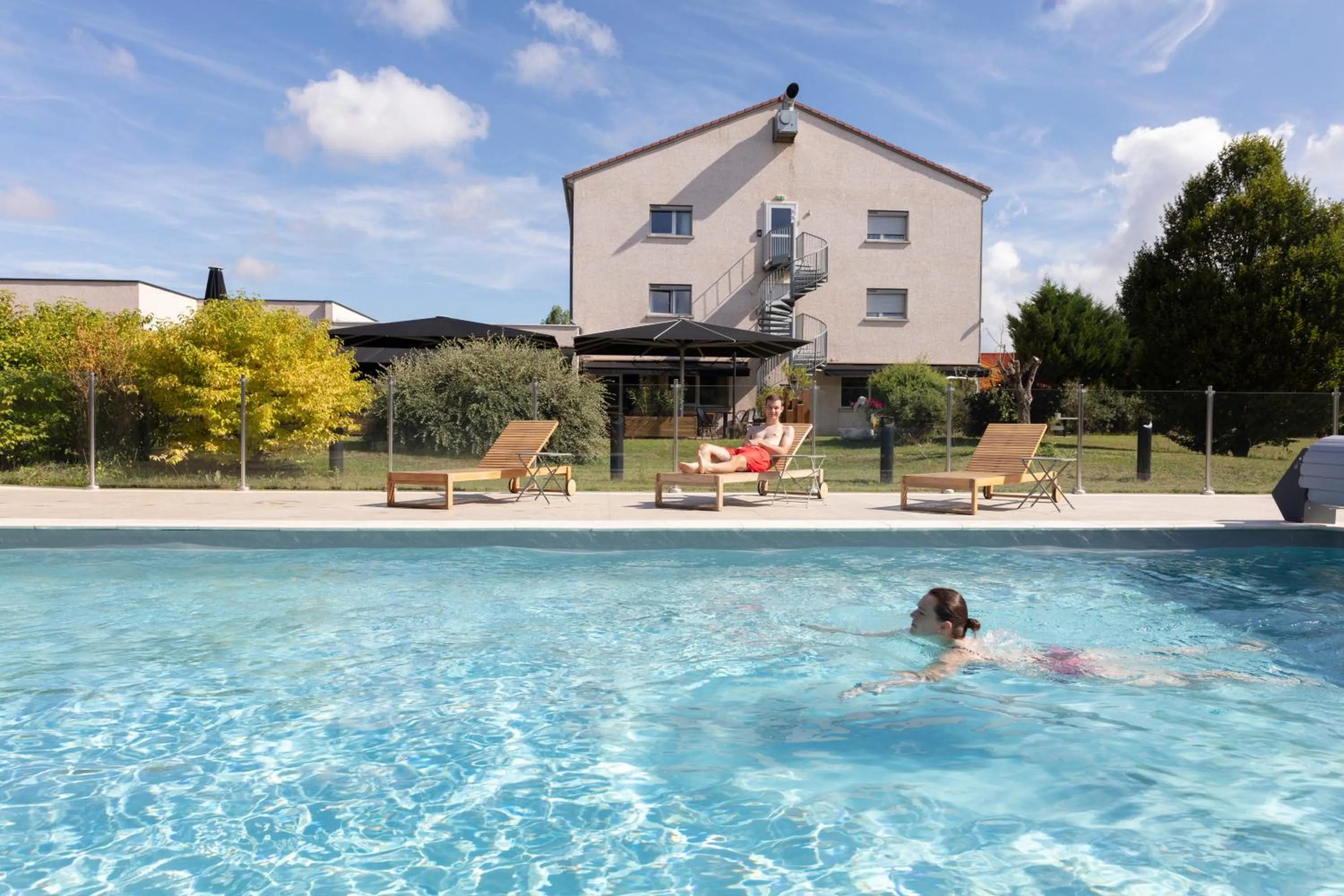 Swimming pool in Artémis Hôtel & Spa Bistro Coquet