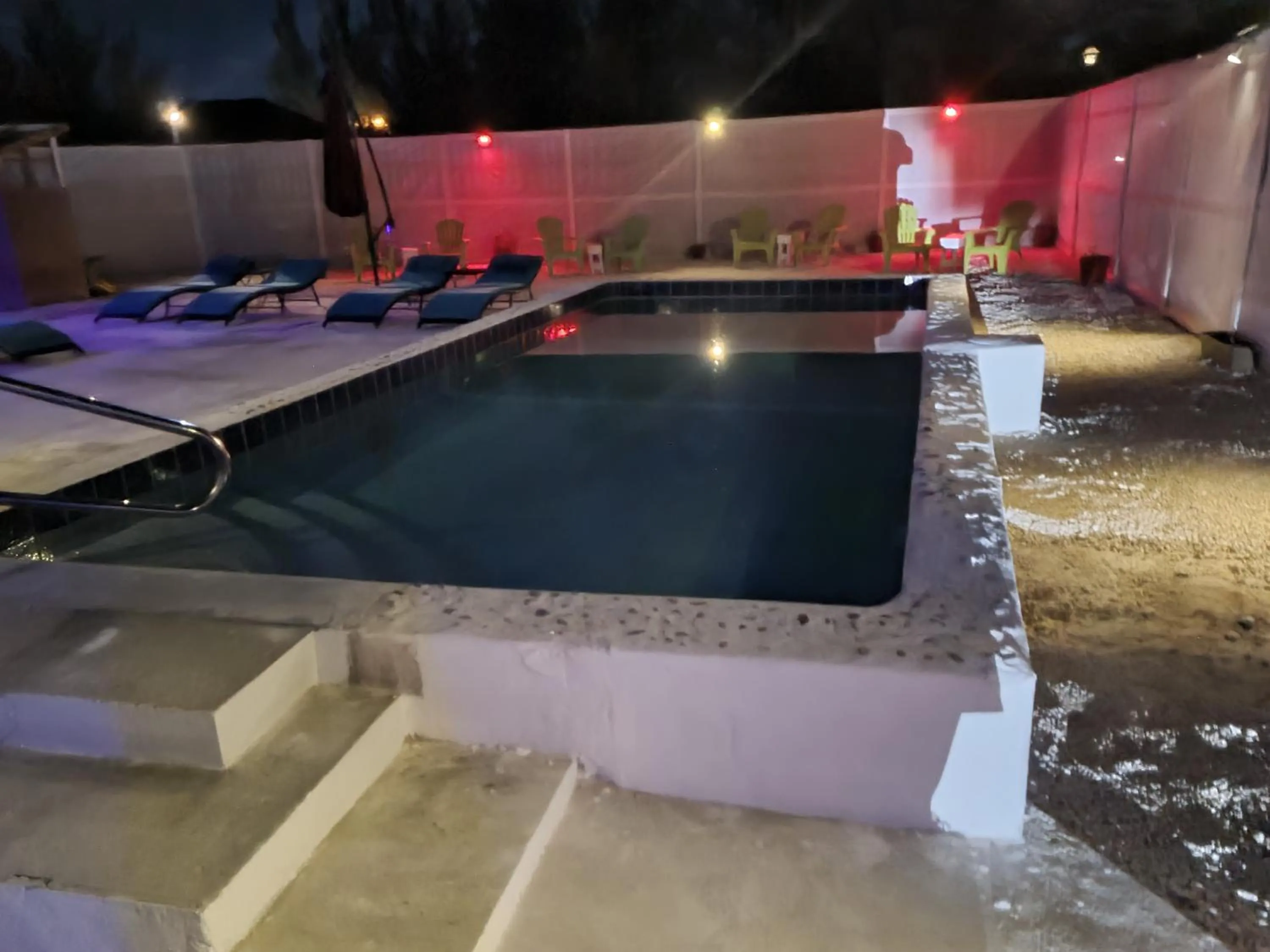 Swimming pool in BELL At The Airport Suites Adults Only - Free Airport Transportation
