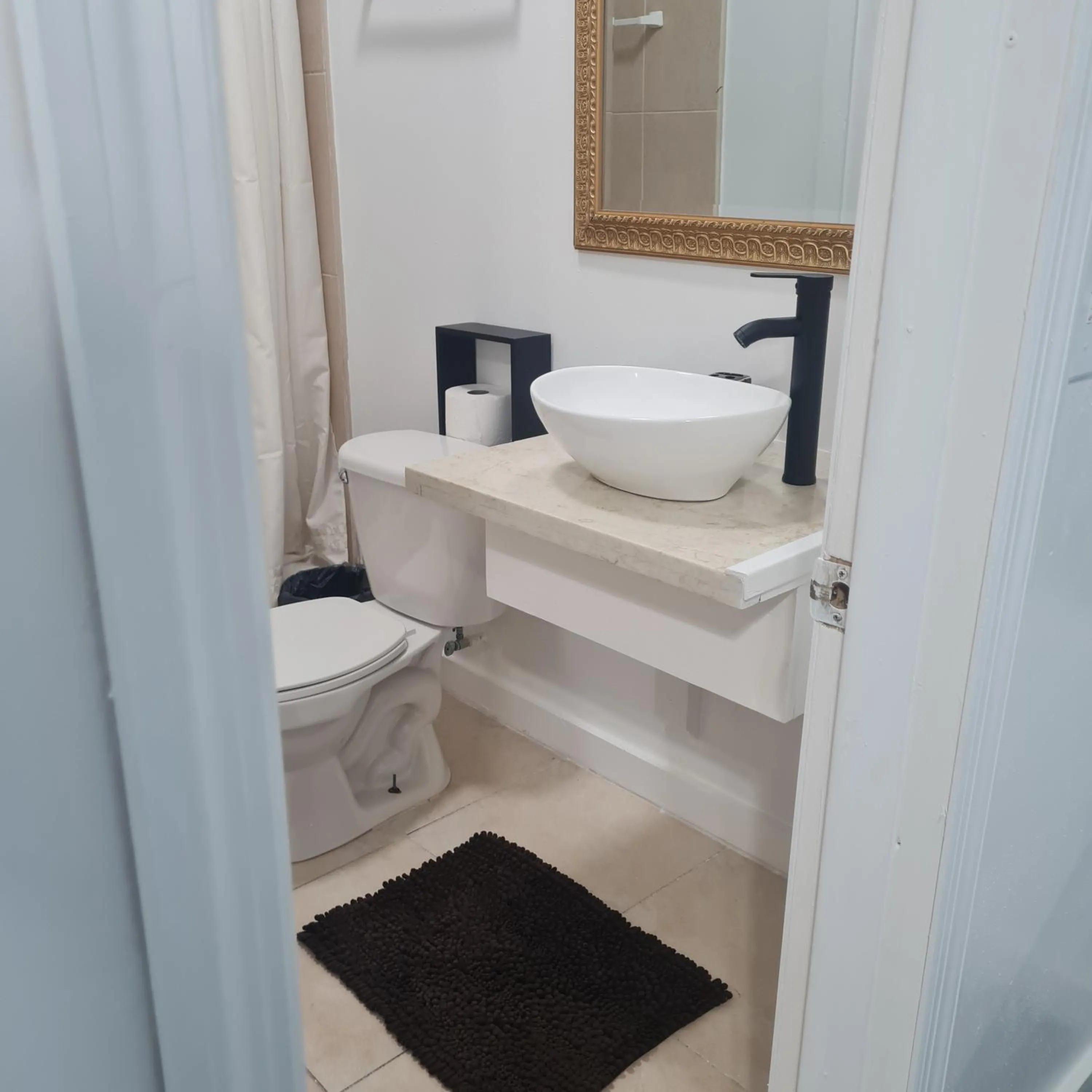 Bathroom in BELL At The Airport Suites Adults Only - Free Airport Transportation