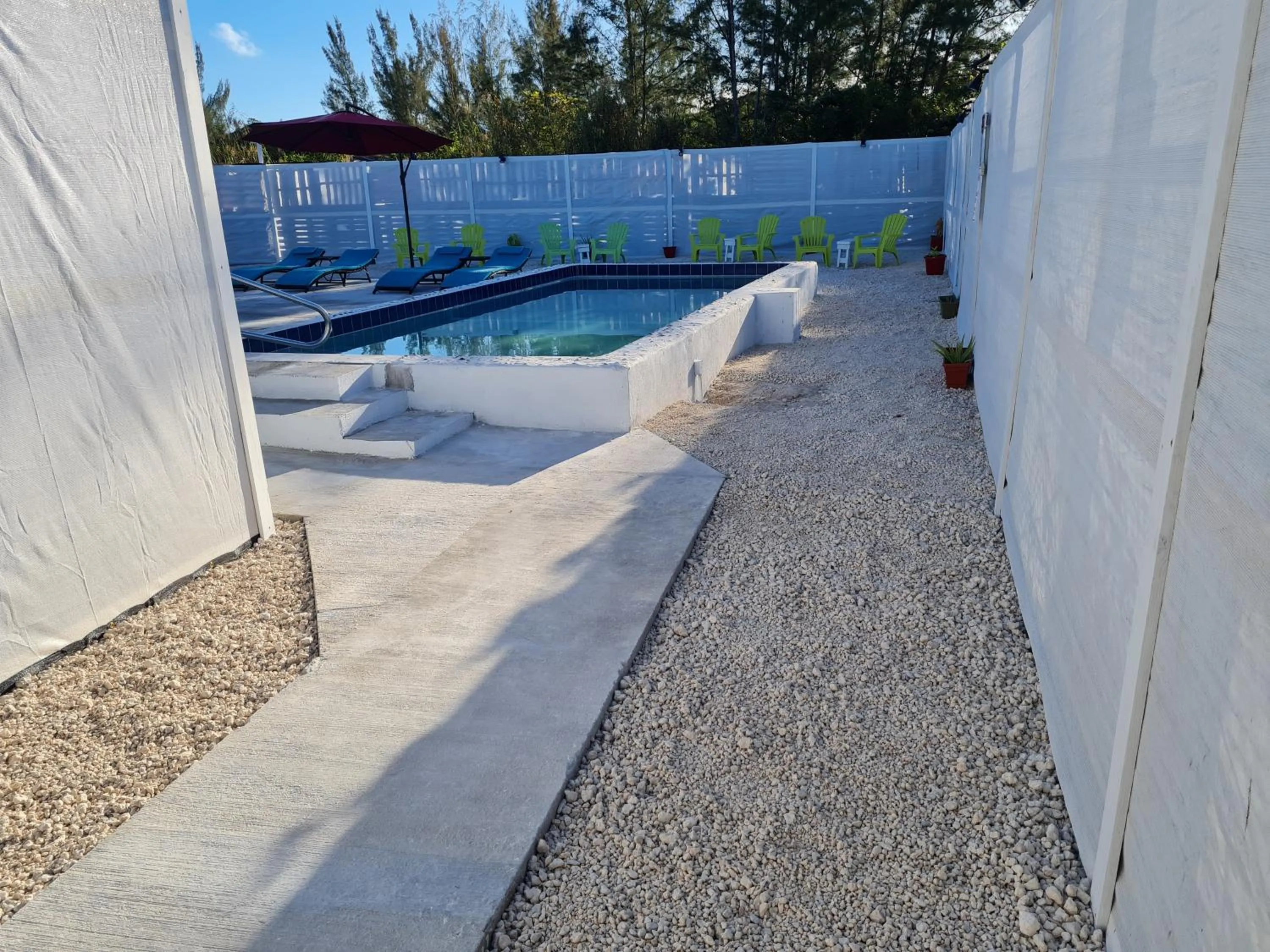 Swimming pool in BELL At The Airport Suites Adults Only - Free Airport Transportation