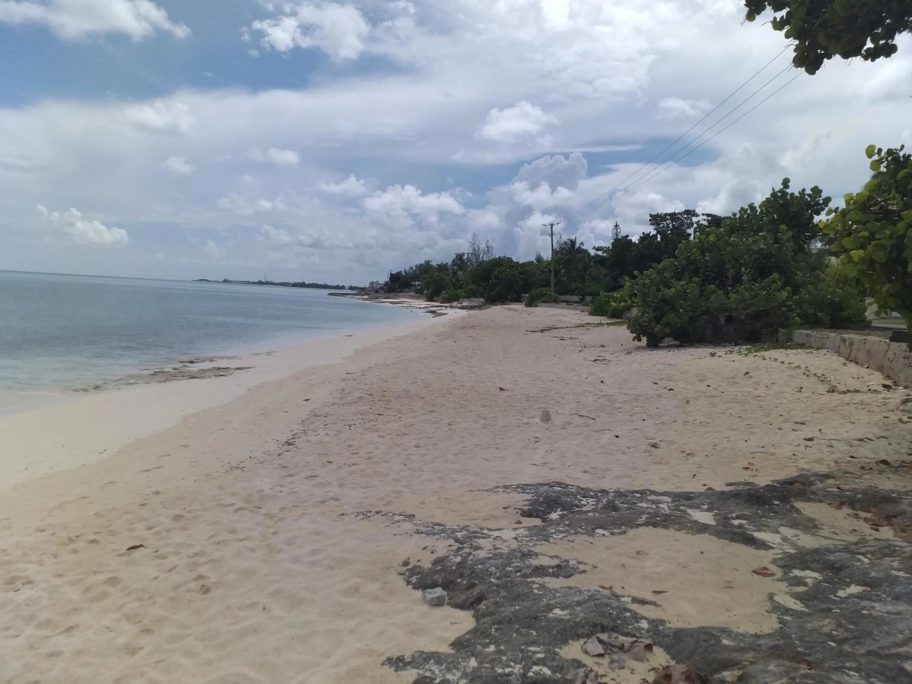 Beach in BELL At The Airport Suites Adults Only - Free Airport Transportation