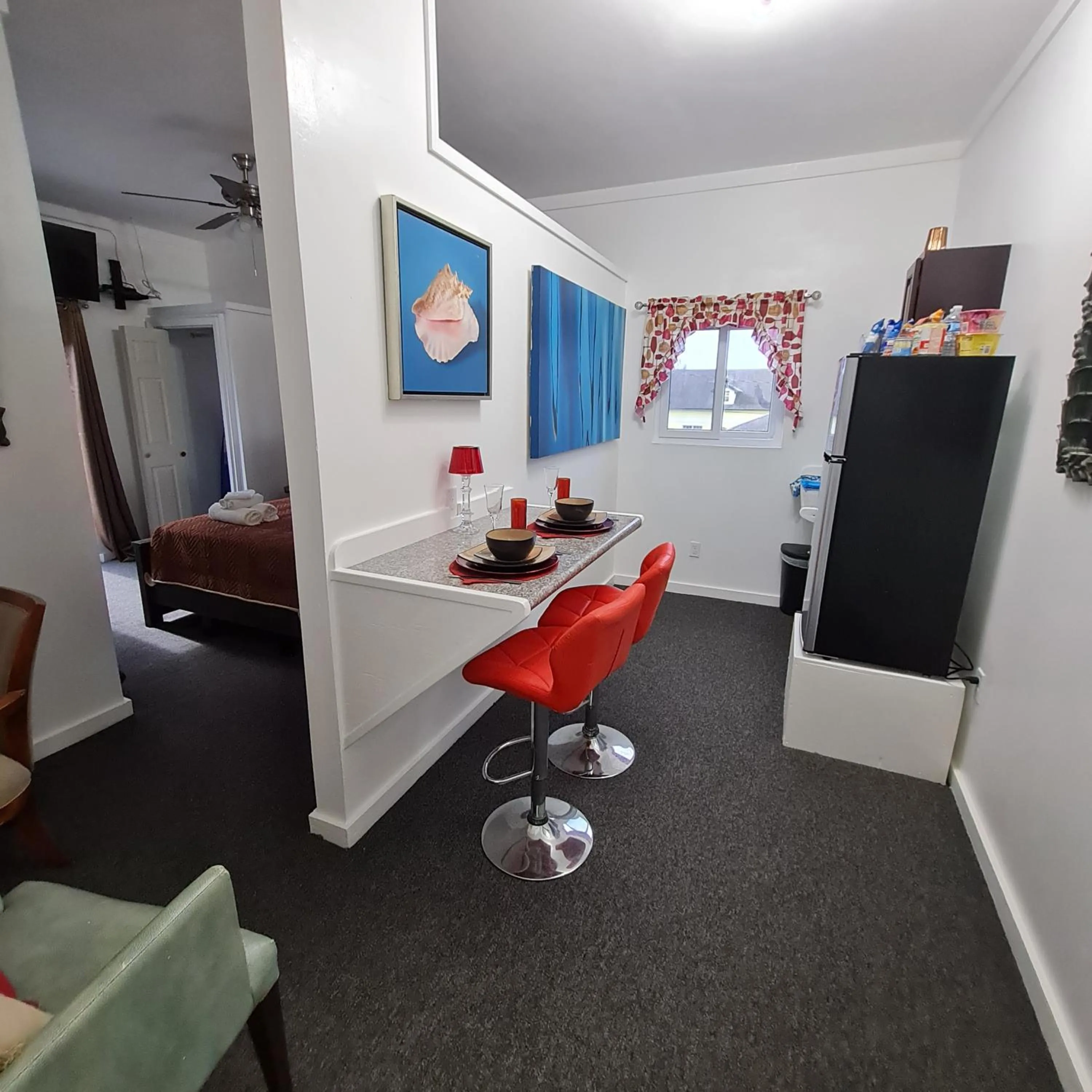 Kitchen or kitchenette in BELL At The Airport Suites Adults Only - Free Airport Transportation