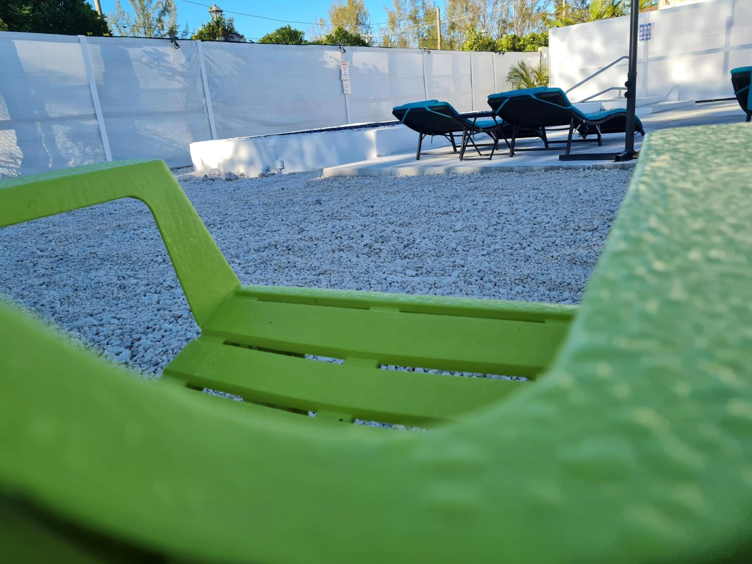 Swimming pool in BELL At The Airport Suites Adults Only - Free Airport Transportation