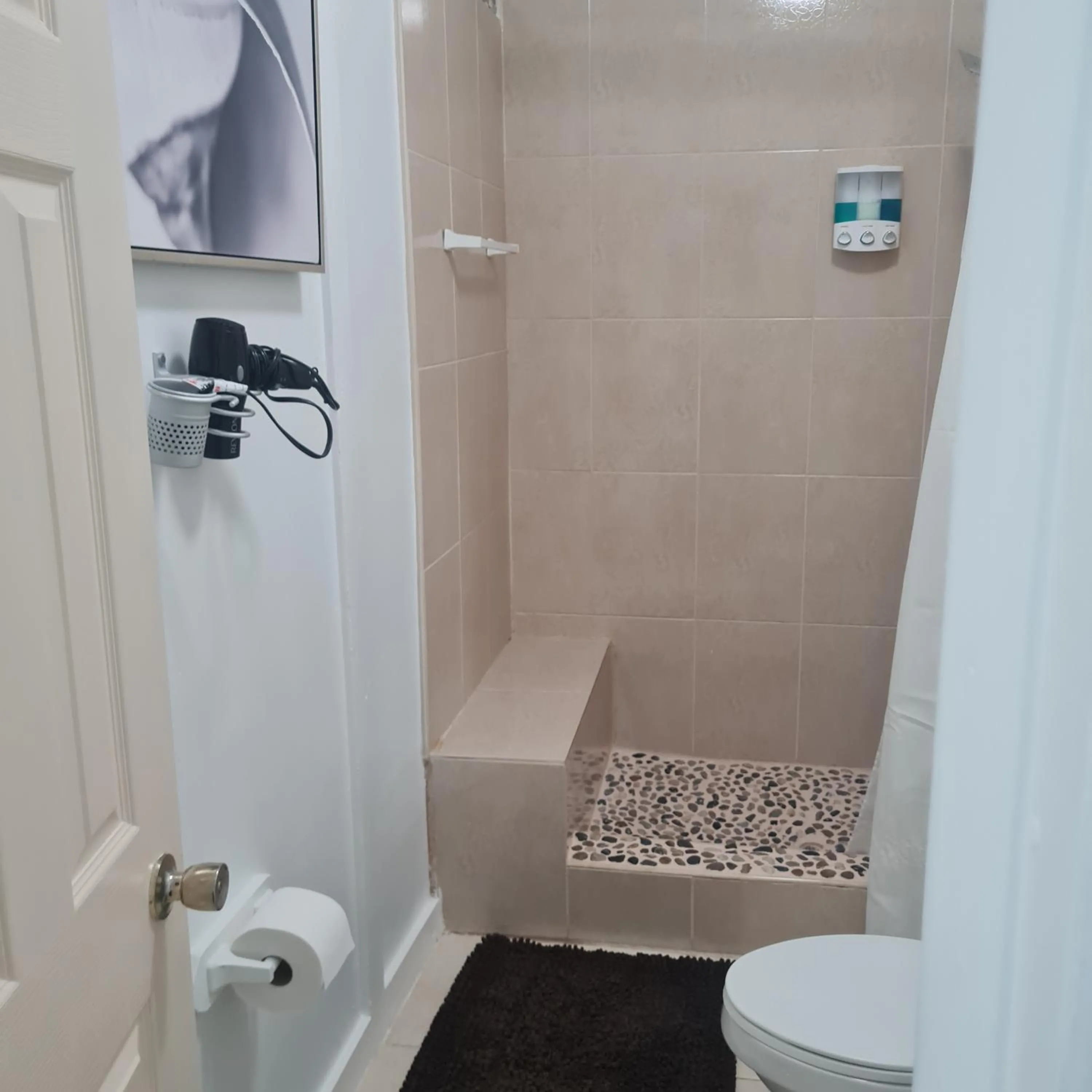 Bathroom in BELL At The Airport Suites Adults Only - Free Airport Transportation