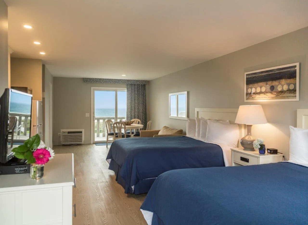 Balcony/Terrace, Bed in Hartman's Briney Breezes Beach Resort