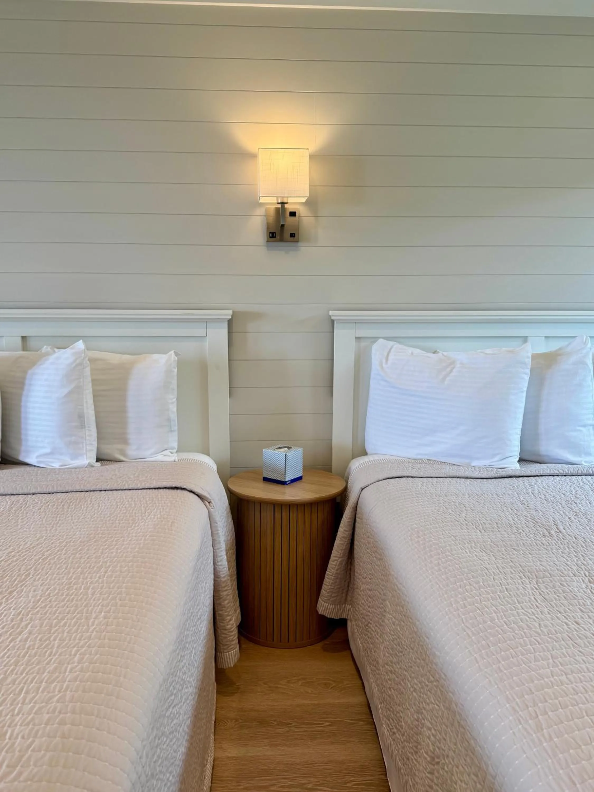 Patio, Bed in Hartman's Briney Breezes Beach Resort