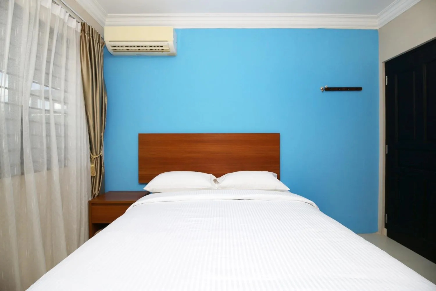 Bedroom, Bed in Safina Inn Syariah Sekupang Batam