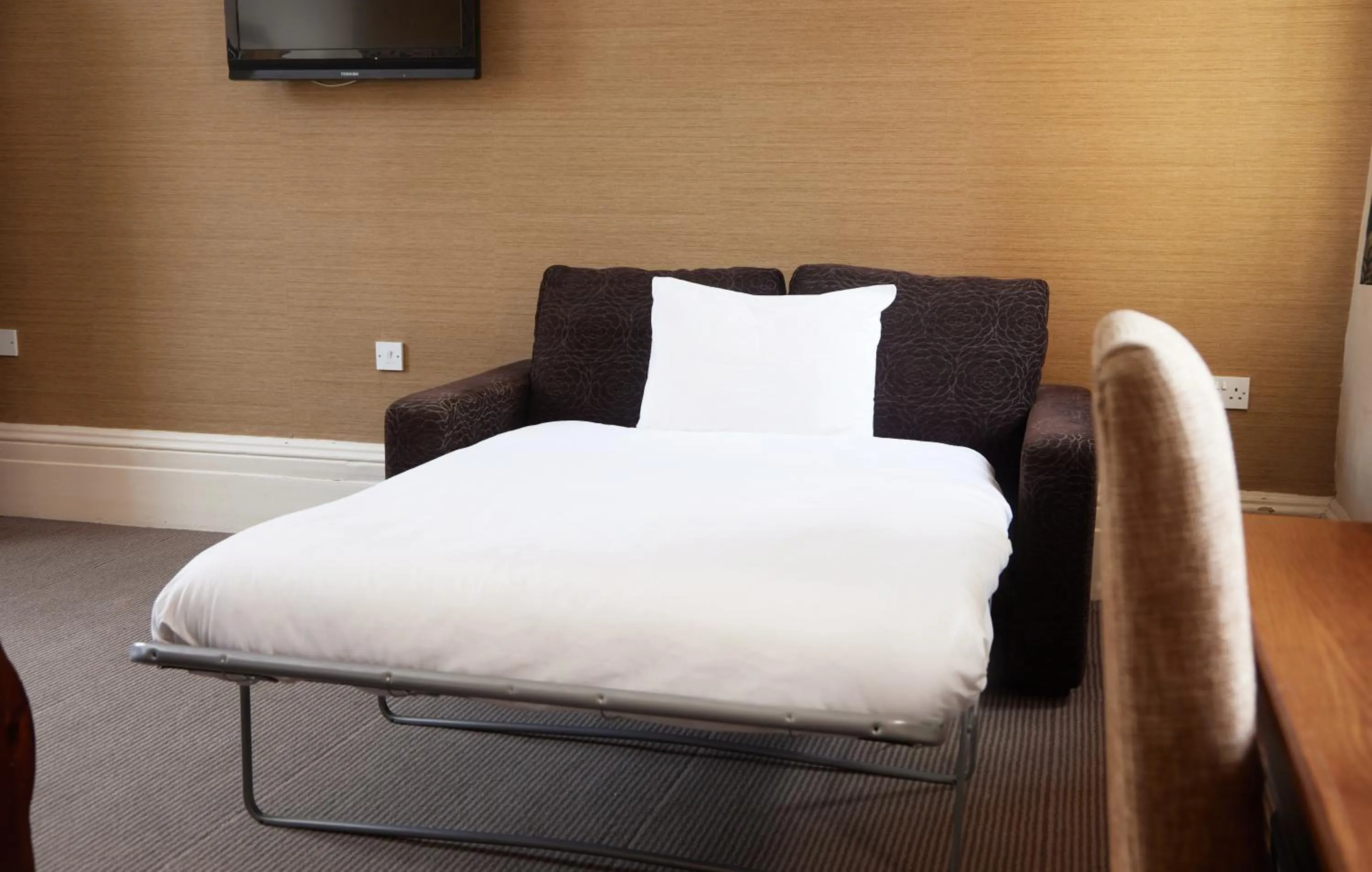 Bed in Kings Arms Hotel by Greene King Inns