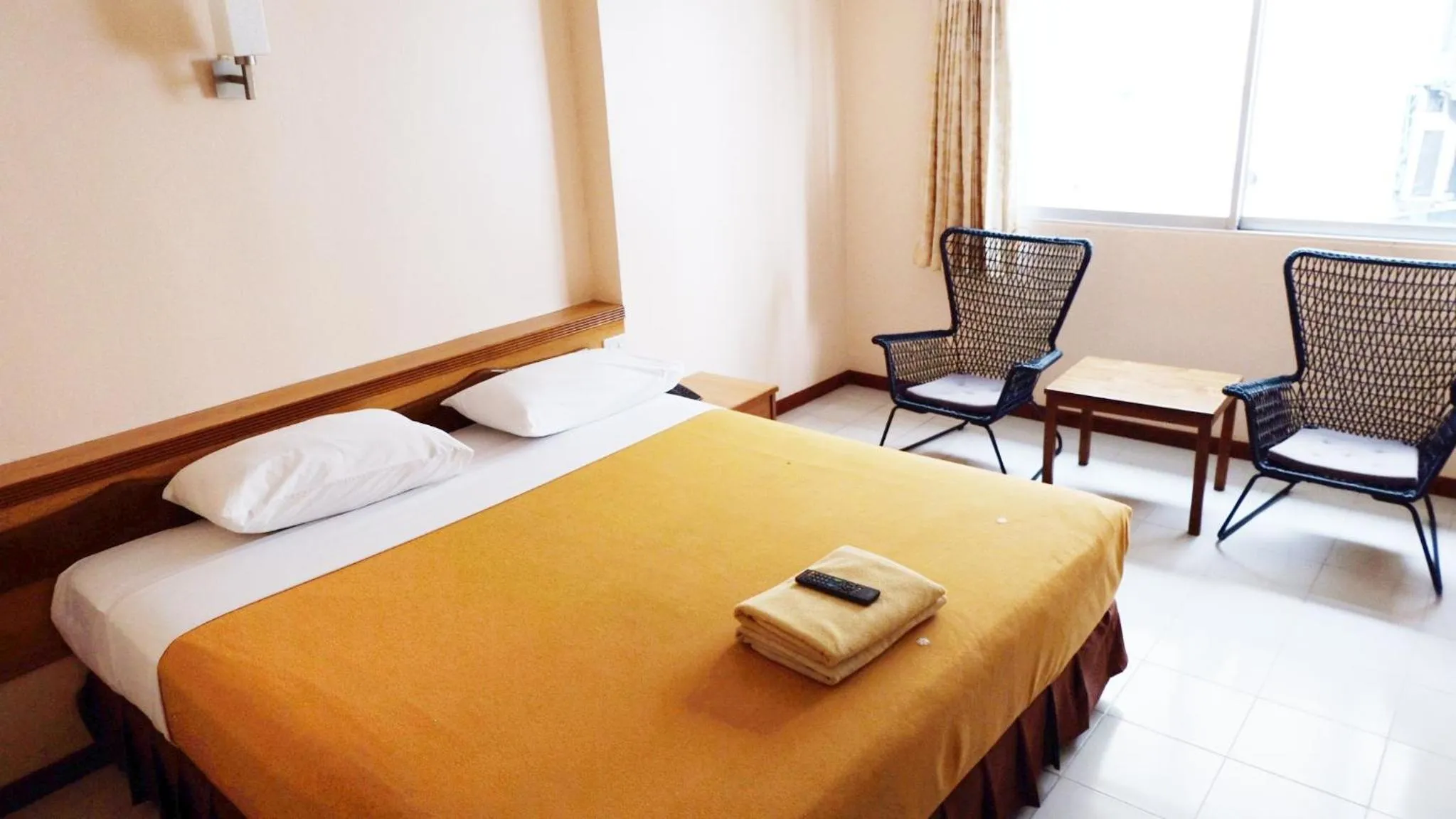 Bed in Top Thai Hotel