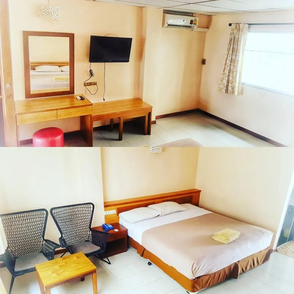 Bed in Top Thai Hotel