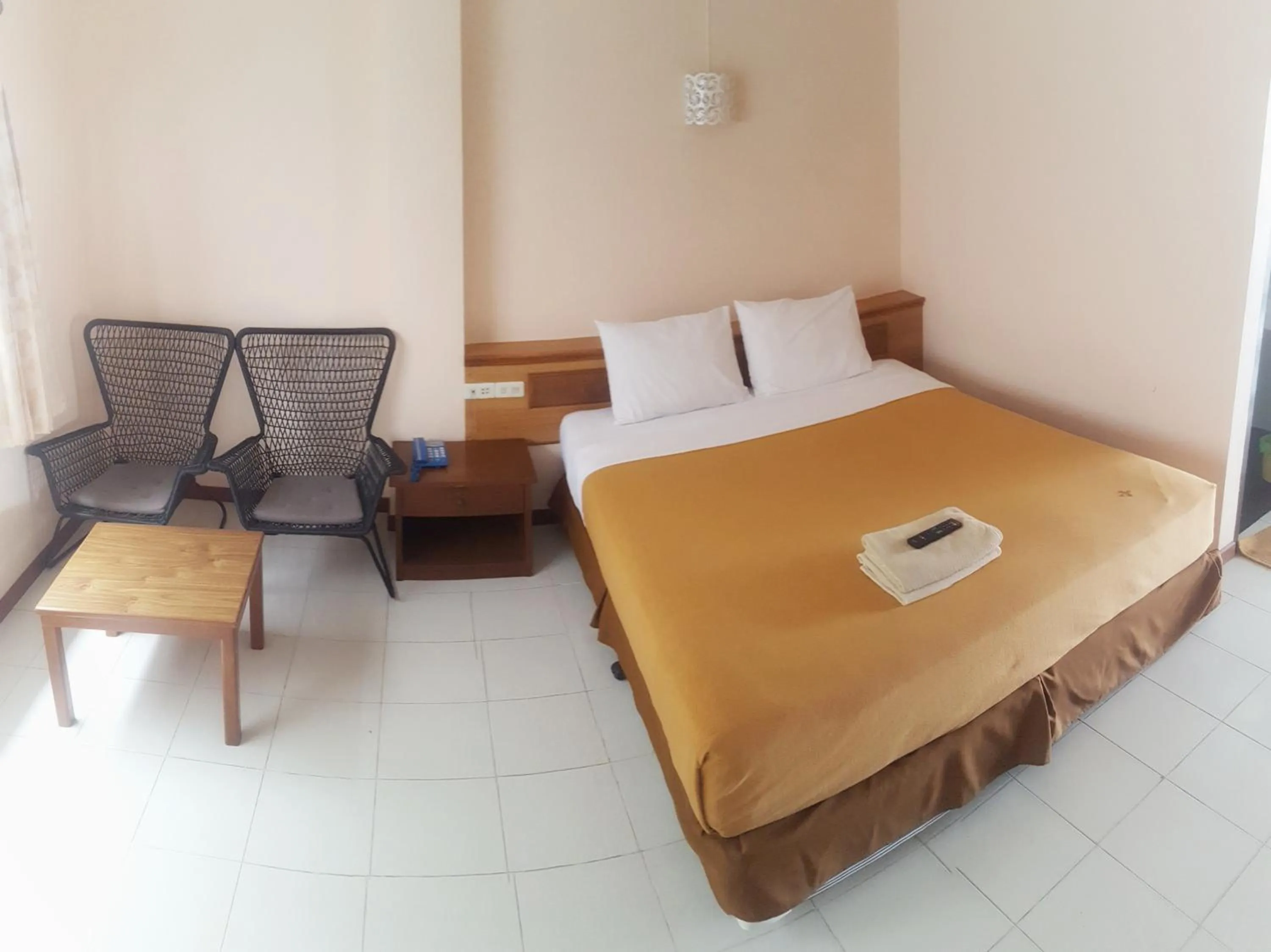 Bed in Top Thai Hotel