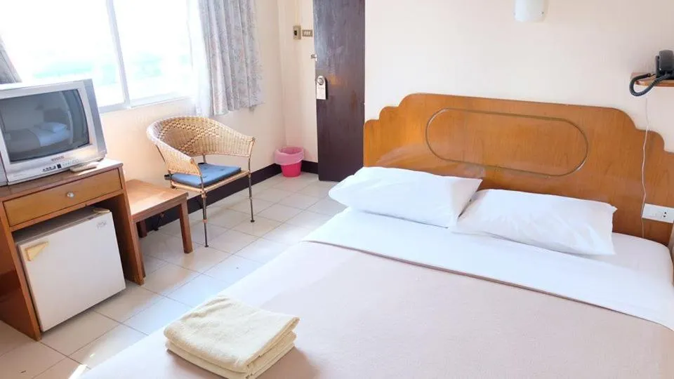 Bed in Top Thai Hotel