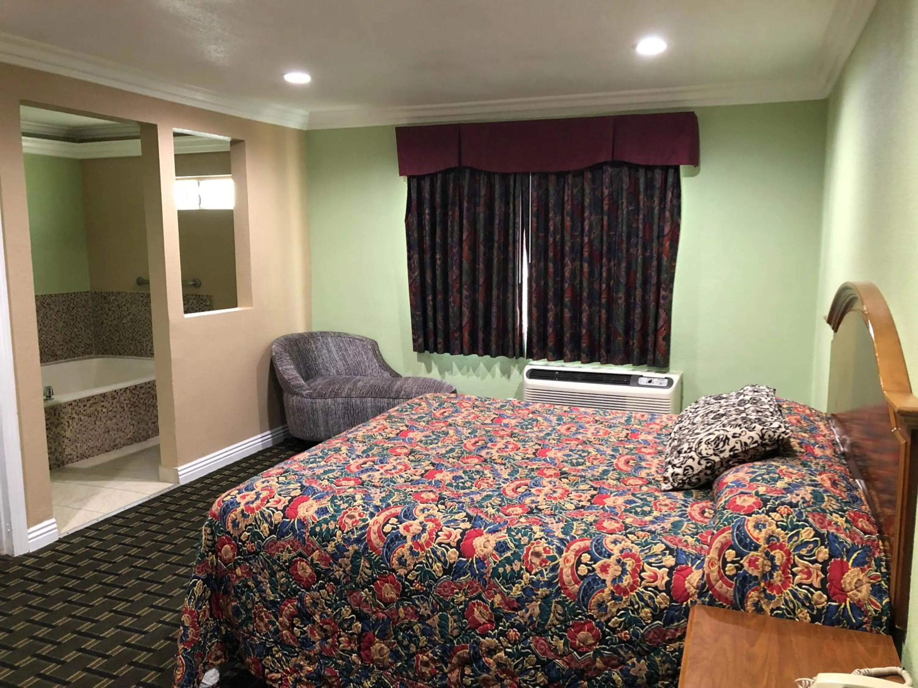 Bedroom in American Inn & Suites LAX Airport