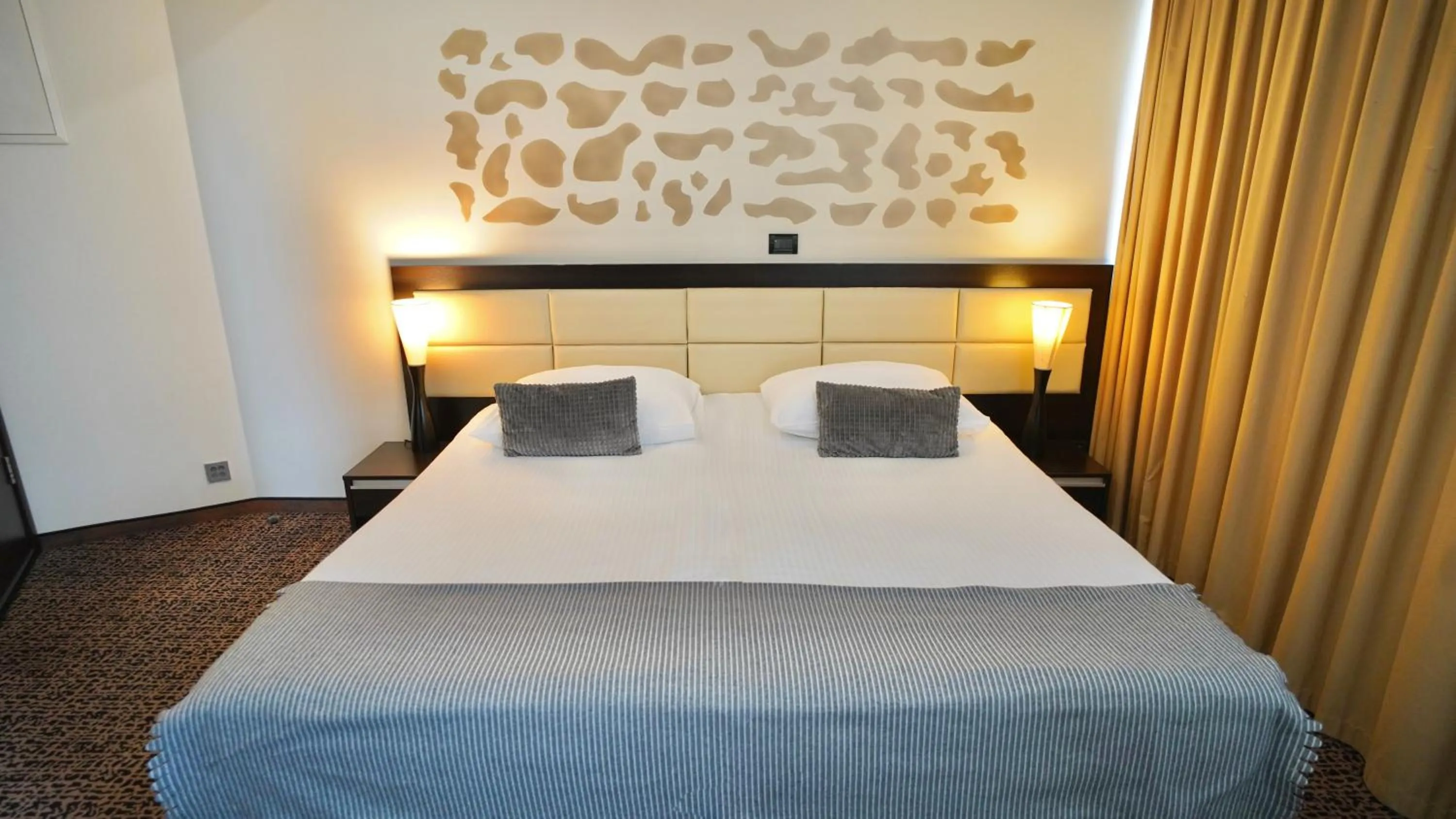 Bed in Hotel Diplomat