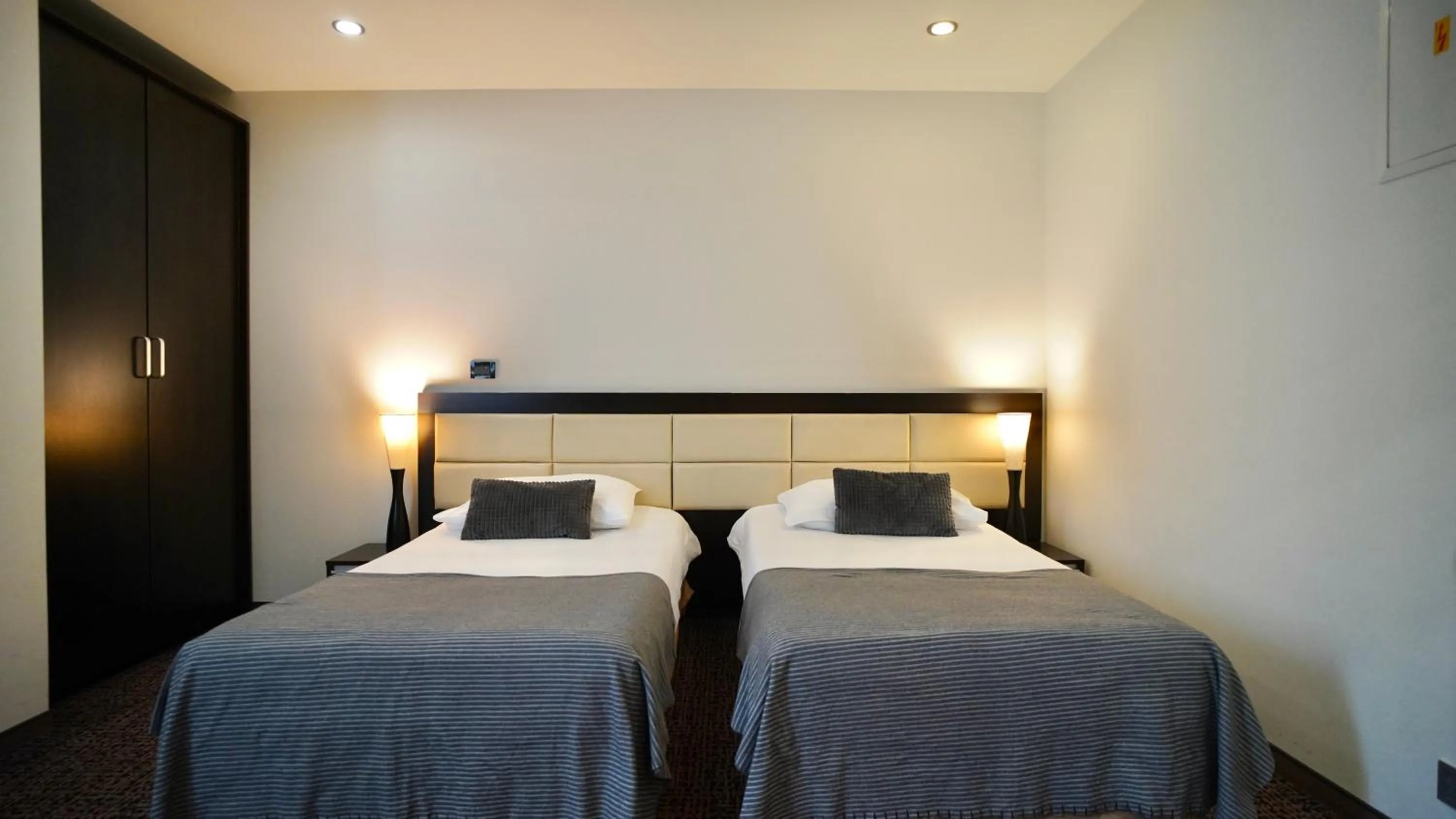 Bed in Hotel Diplomat