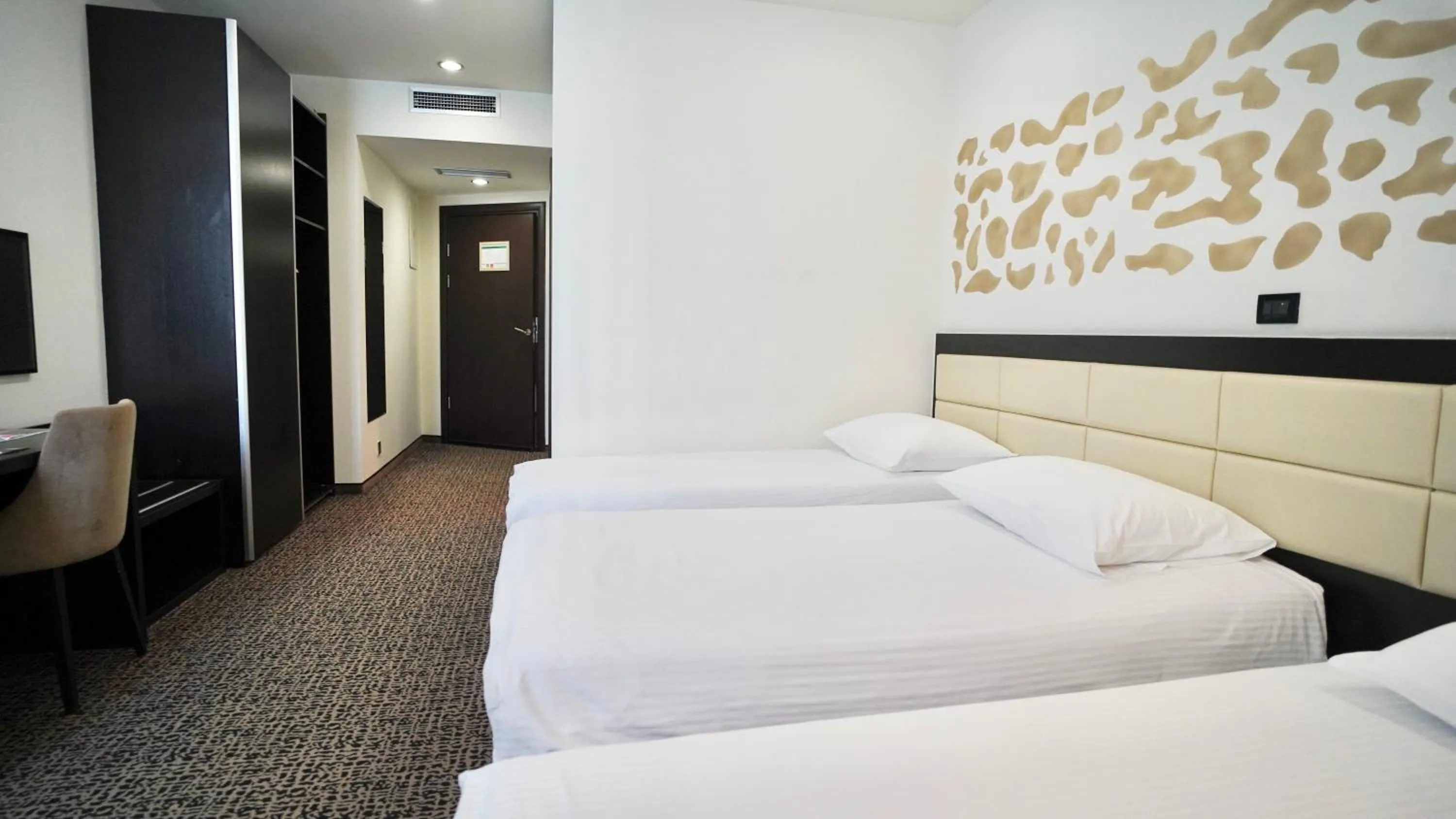 Bed in Hotel Diplomat